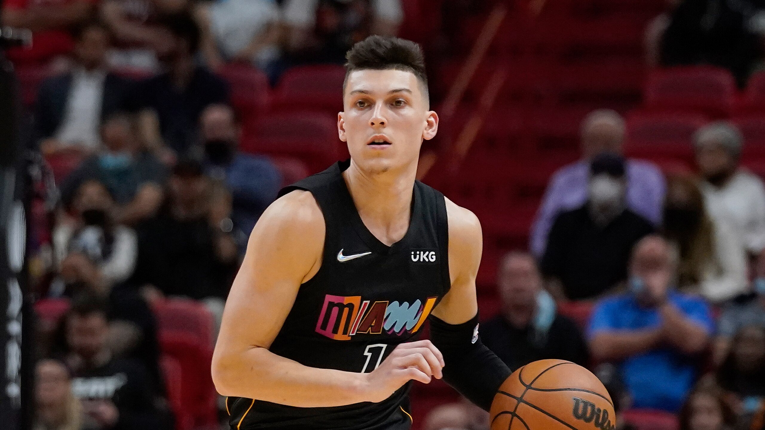 Miami Heat guard Tyler Herro takes the ball down court during the first half of an NBA basketball game against the New Orleans Pelicans, Wednesday, Nov. 17, 2021, in Miami. (AP Photo/Wilfredo Lee)