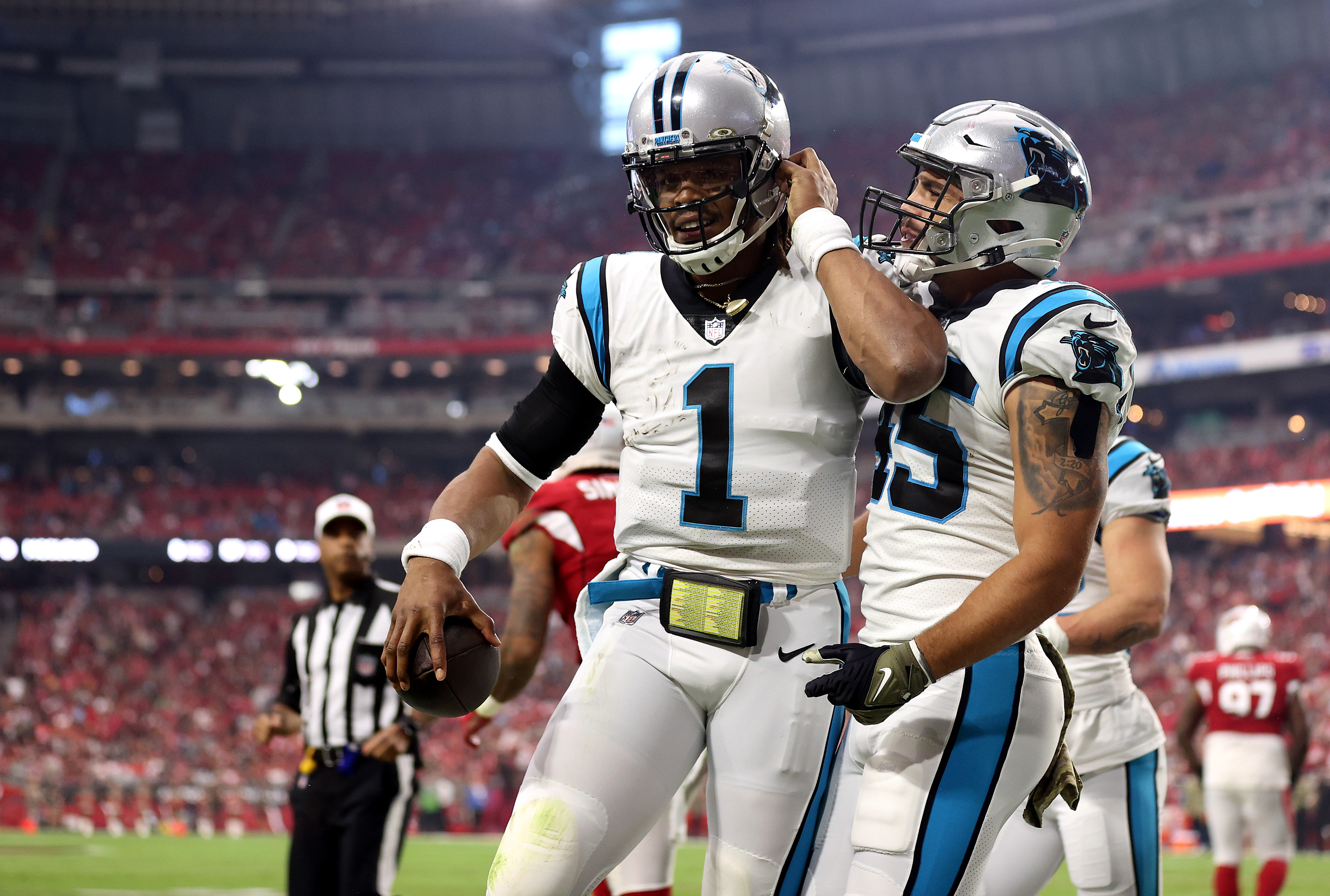 GLENDALE, ARIZONA - NOVEMBER 14: Cam Newton #1 of the Carolina Panthers reacts after scoring on a rushing touchdown against the Arizona Cardinals in the first quarter at State Farm Stadium on November 14, 2021 in Glendale, Arizona. (Photo by Christian Petersen/Getty Images)