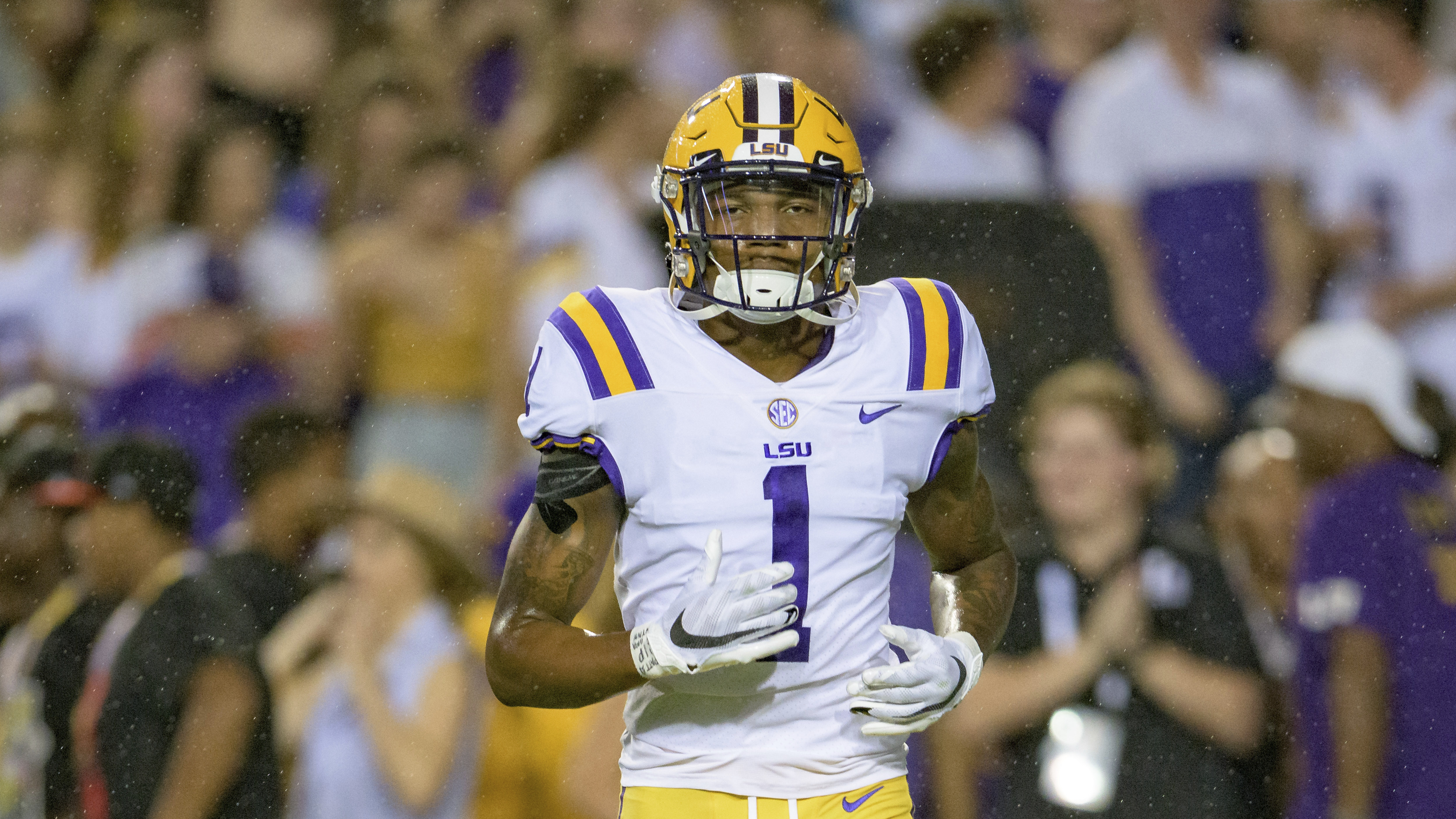 LSU cornerback Eli Ricks (1) runs during an NCAA football game against Auburn on Saturday, Oct. 2, 2021, in Baton Rouge, La. (AP Photo/Matthew Hinton)