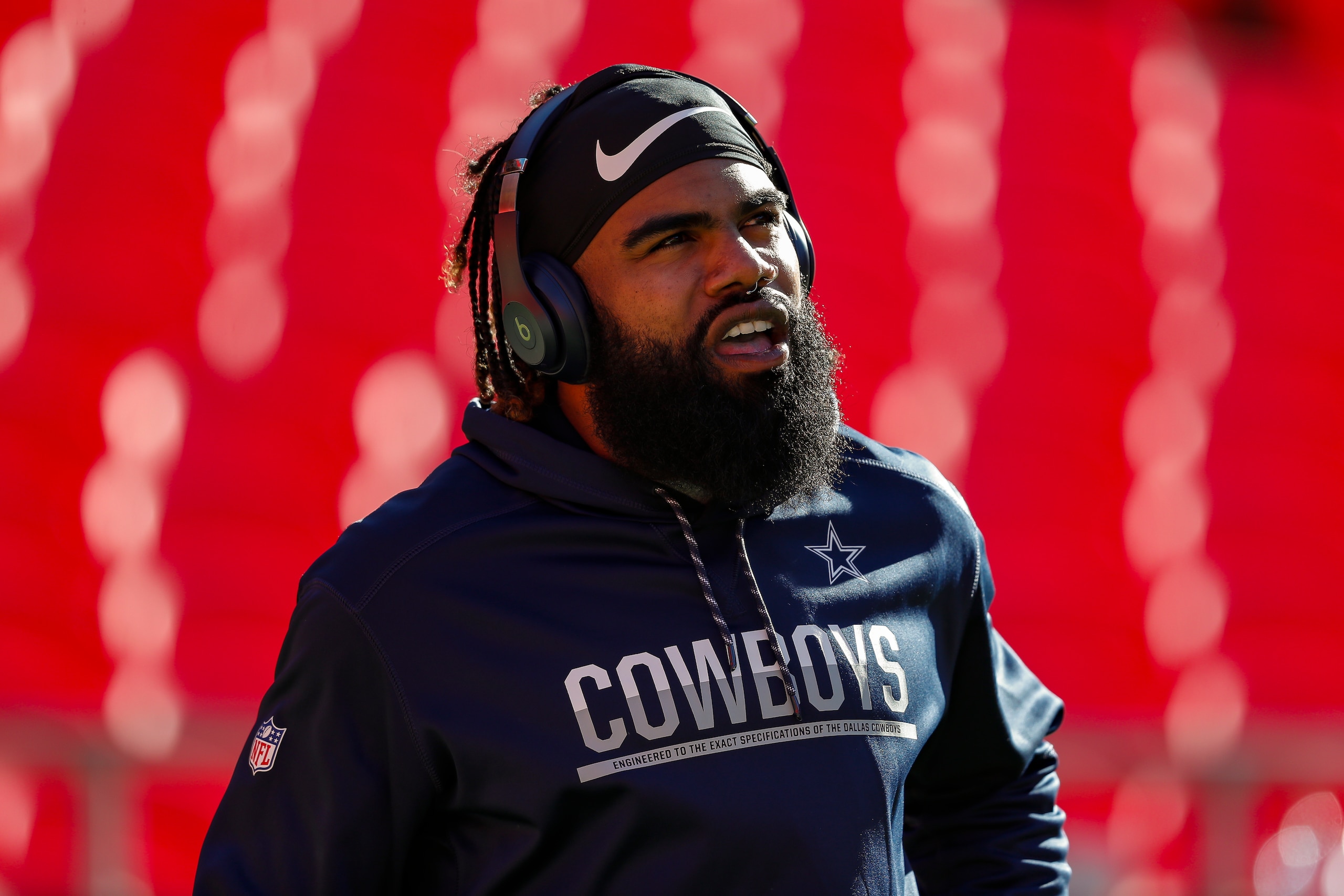 KANSAS CITY, MO - NOVEMBER 21: Ezekiel Elliott #21 of the Dallas Cowboys walks the field prior to the game between the Kansas City Chiefs and the Dallas Cowboys at Arrowhead Stadium on November 21, 2021 in Kansas City, Missouri. (Photo by David Eulitt/Getty Images)