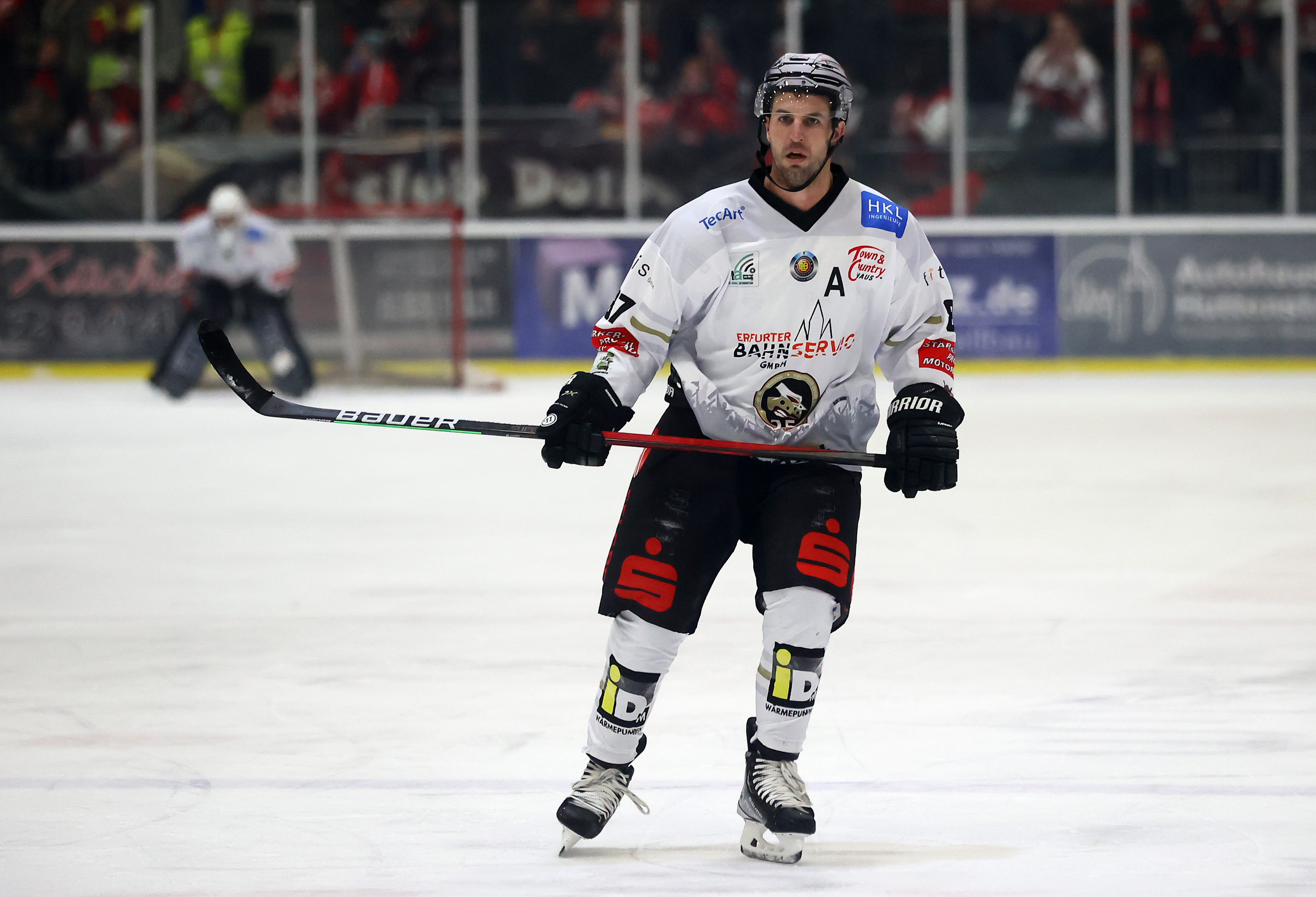 HALLE, GERMANY - NOVEMBER 16: Kyle Beach of TecArt Black Dragons Erfurt skates against the Saale Bulls Halle during the Oberliga Nord match between Saale Bulls Halle and TecArt Black Dragons Erfurt at Sparkassen-Eisdom on November 16, 2021 in Halle, Germany. (Photo by Martin Rose/Getty Images)