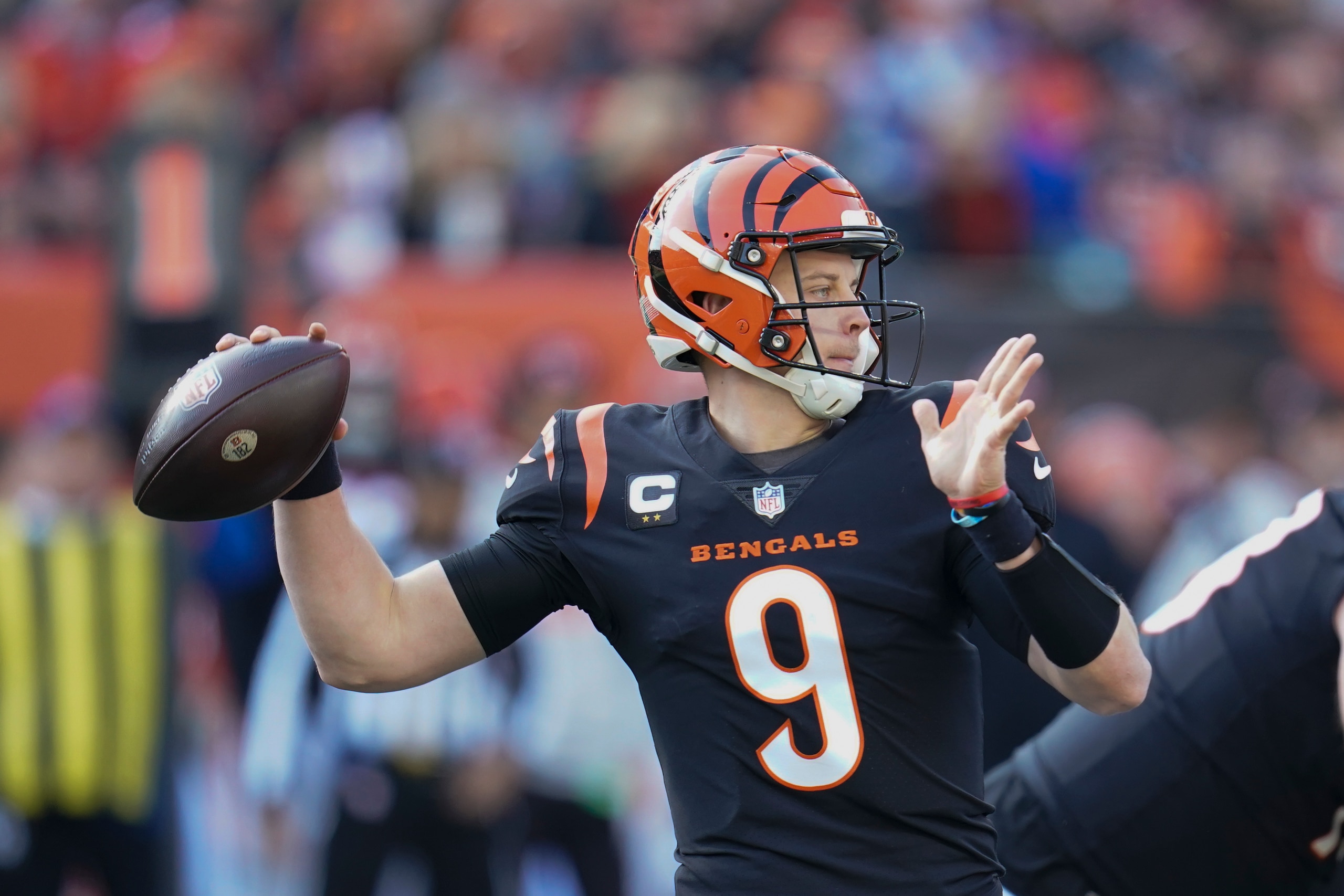 Cincinnati Bengals quarterback Joe Burrow (9) throws during the first half of an NFL football game against the Los Angeles Chargers, Sunday, Dec. 5, 2021, in Cincinnati. (AP Photo/Michael Conroy) Cincinnati Bengals quarterback Joe Burrow (9) throws during the first half of an NFL football game against the Los Angeles Chargers, Sunday, Dec. 5, 2021, in Cincinnati. (AP Photo/Michael Conroy)
