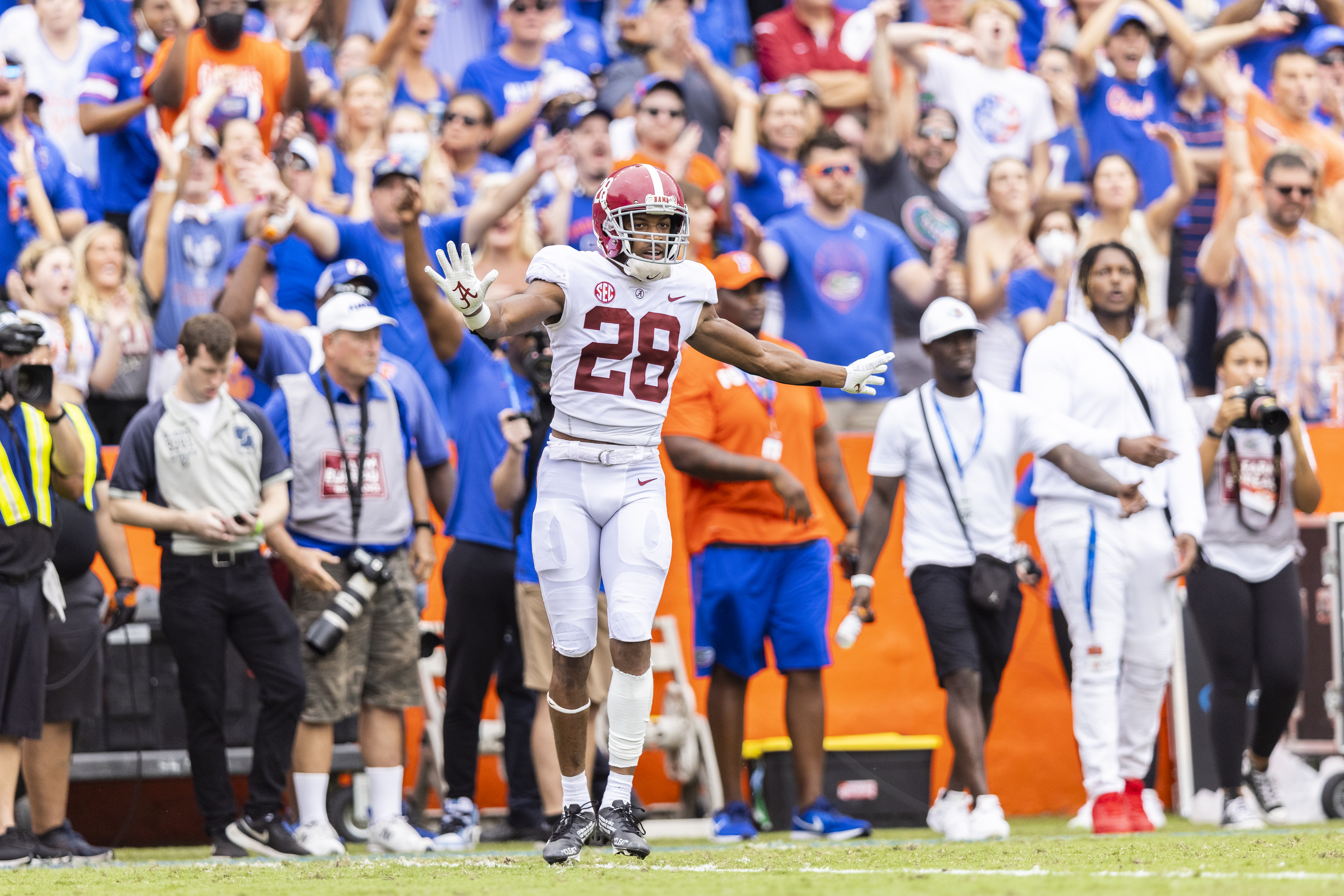 GAINESVILLE, FLORIDA - SEPTEMBER 18: Josh Jobe #28 of the Alabama Crimson Tide reacts to a flag during the second quarter of  a game against the Florida Gators at Ben Hill Griffin Stadium on September 18, 2021 in Gainesville, Florida. (Photo by James Gilbert/Getty Images)