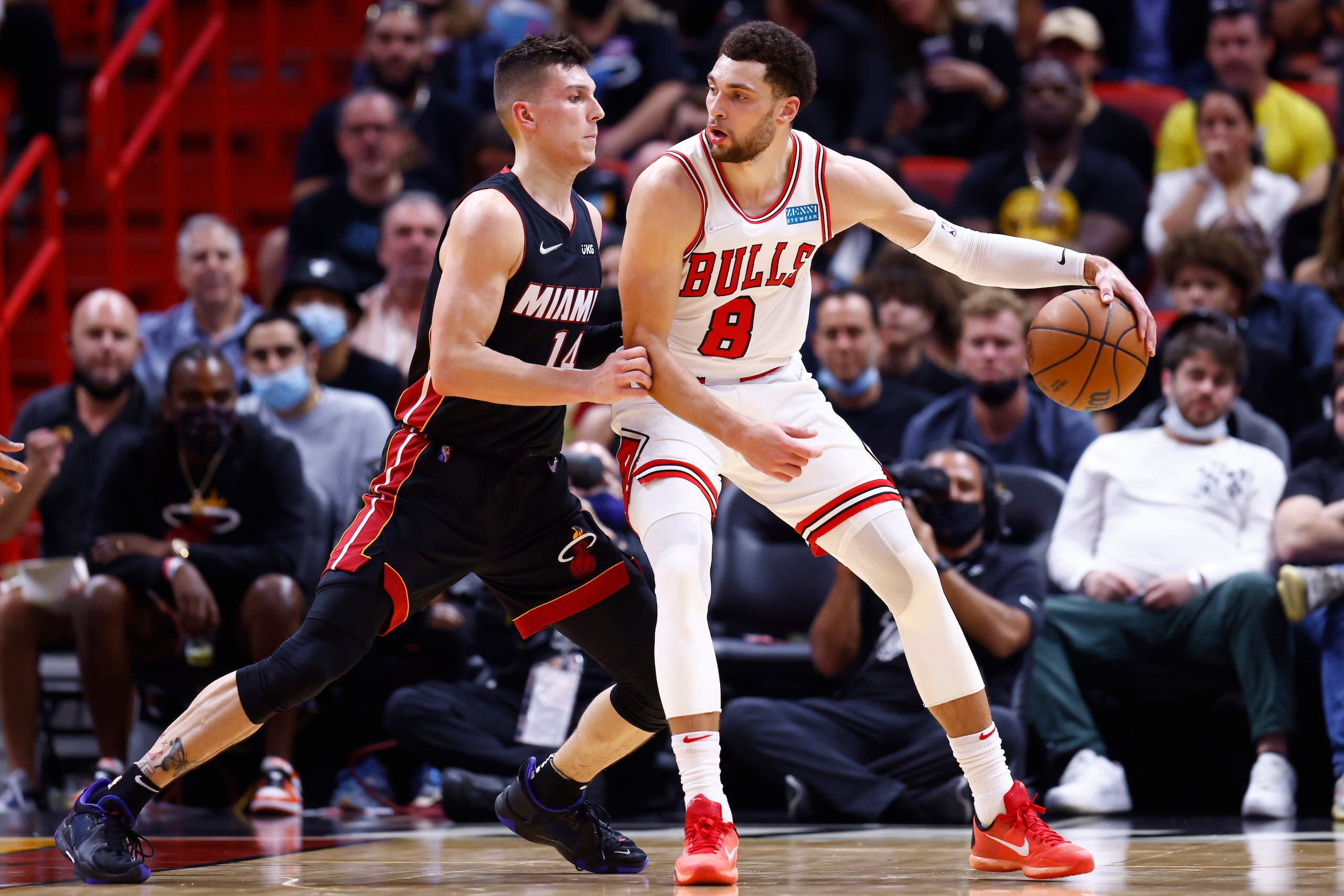 MIAMI, FLORIDA - DECEMBER 11: Zach LaVine #8 of the Chicago Bulls is defended by Tyler Herro #14 of the Miami Heat during the first half at FTX Arena on December 11, 2021 in Miami, Florida. NOTE TO USER: User expressly acknowledges and agrees that, by downloading and or using this photograph, User is consenting to the terms and conditions of the Getty Images License Agreement. (Photo by Michael Reaves/Getty Images) MIAMI, FLORIDA - DECEMBER 11: Zach LaVine #8 of the Chicago Bulls is defended by Tyler Herro #14 of the Miami Heat during the first half at FTX Arena on December 11, 2021 in Miami, Florida. NOTE TO USER: User expressly acknowledges and agrees that, by downloading and or using this photograph, User is consenting to the terms and conditions of the Getty Images License Agreement. (Photo by Michael Reaves/Getty Images)
