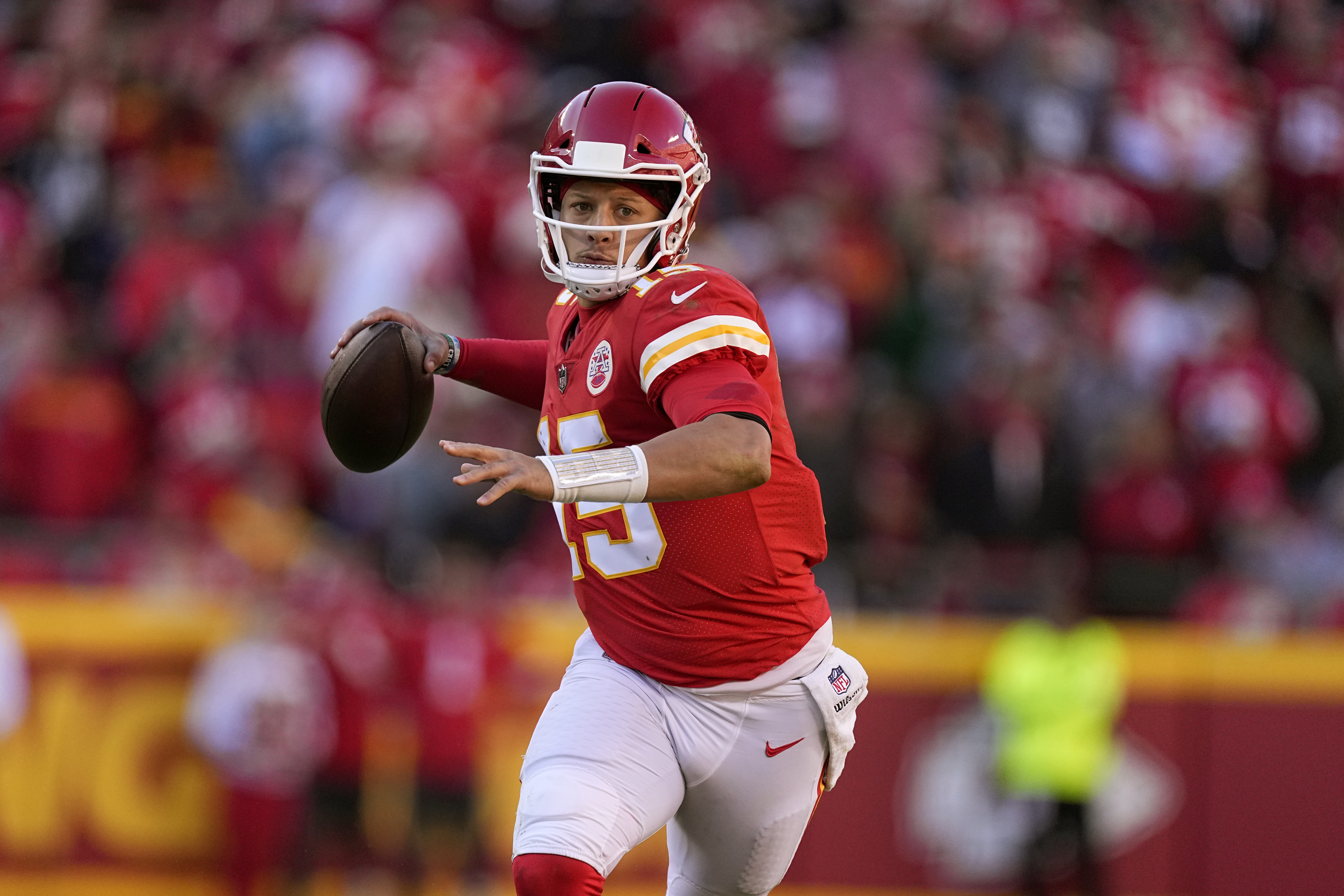 Kansas City Chiefs quarterback Patrick Mahomes throws during the second half of an NFL football game against the Las Vegas Raiders Sunday, Dec. 12, 2021, in Kansas City, Mo. (AP Photo/Charlie Riedel)
