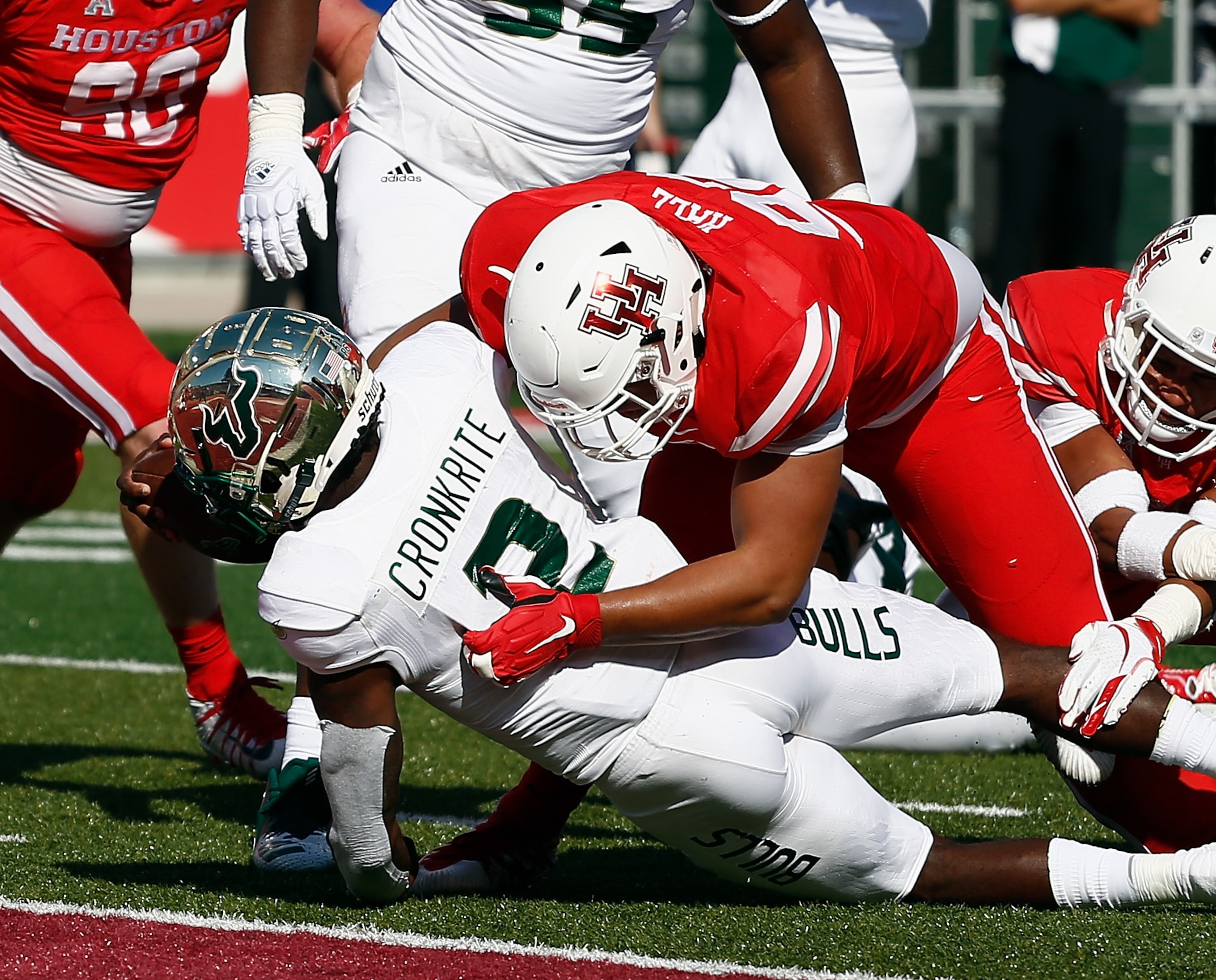 HOUSTON, TX - OCTOBER 27: Jordan Cronkrite #2 of the South Florida Bulls is stopped short of the goal line by Logan Hall #92 of the Houston Cougars in the second quarter on October 27, 2018 in Houston, Texas. (Photo by Bob Levey/Getty Images) HOUSTON, TX - OCTOBER 27: Jordan Cronkrite #2 of the South Florida Bulls is stopped short of the goal line by Logan Hall #92 of the Houston Cougars in the second quarter on October 27, 2018 in Houston, Texas. (Photo by Bob Levey/Getty Images)