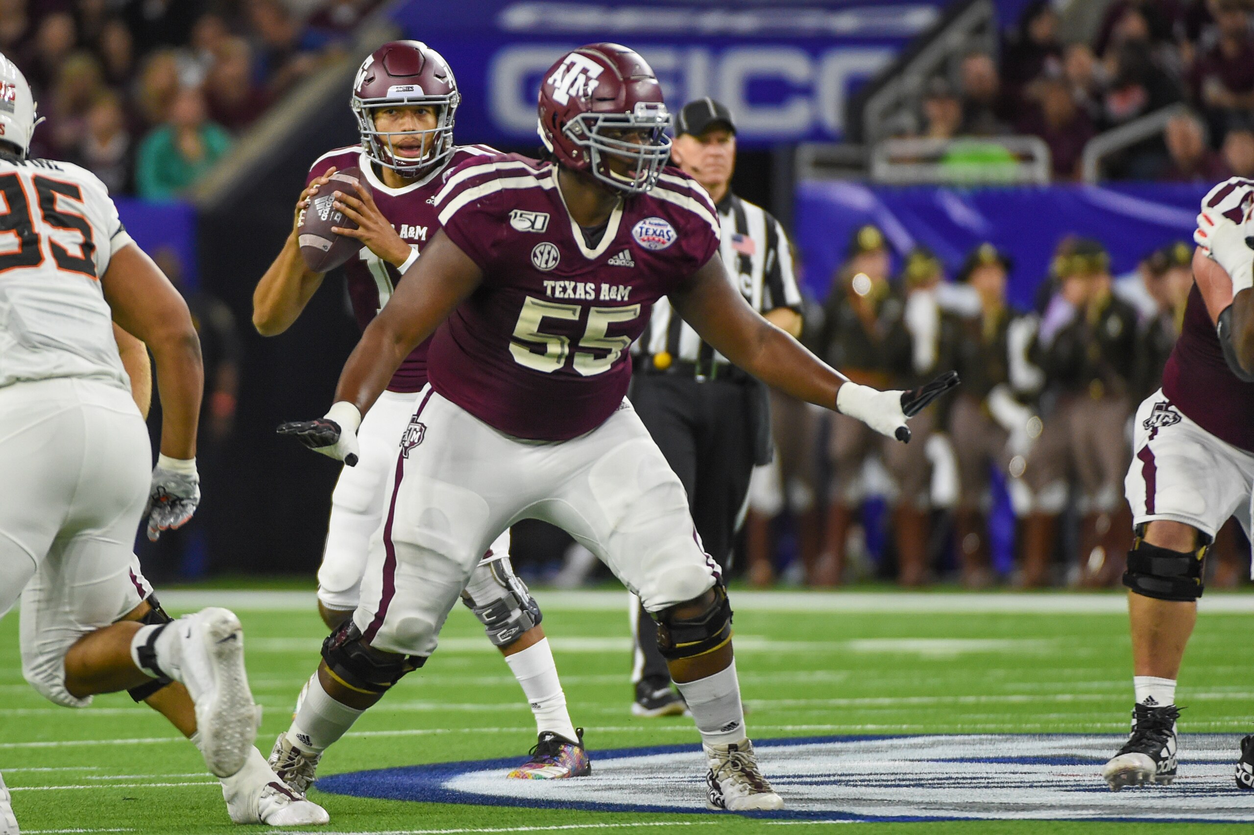 HOUSTON, TX - DECEMBER 27: Texas A&M Aggies offensive lineman Kenyon Green (55) pass blocks during the football game between the Oklahoma State Cowboys and Texas A&M Aggies at NRG Stadium on December 27, 2019 in Houston, TX. (Photo by Ken Murray/Icon Sportswire via Getty Images)