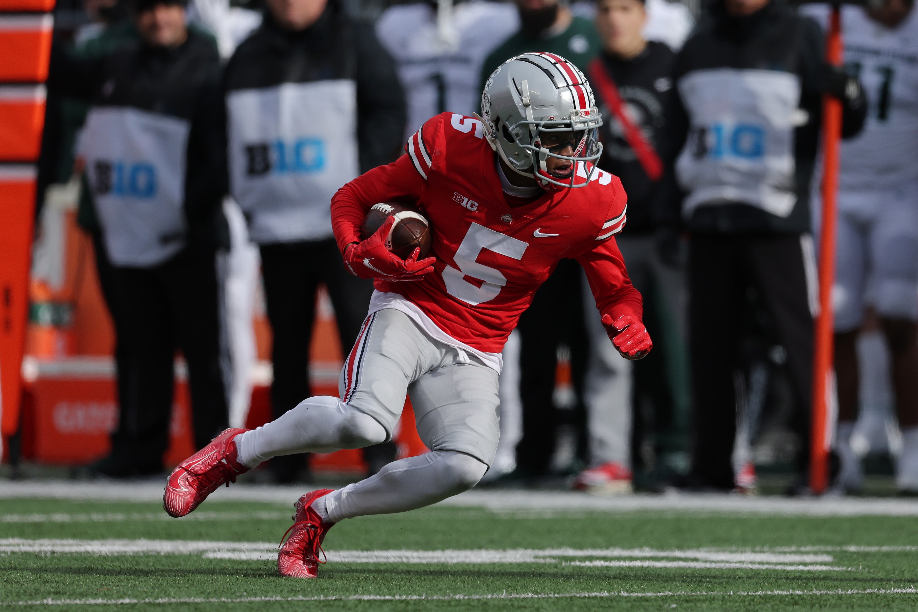 COLUMBUS, OHIO - NOVEMBER 20: Garrett Wilson #5 of the Ohio State Buckeyes plays against the Michigan State Spartans at Ohio Stadium on November 20, 2021 in Columbus, Ohio. (Photo by Gregory Shamus/Getty Images) COLUMBUS, OHIO - NOVEMBER 20: Garrett Wilson #5 of the Ohio State Buckeyes plays against the Michigan State Spartans at Ohio Stadium on November 20, 2021 in Columbus, Ohio. (Photo by Gregory Shamus/Getty Images)