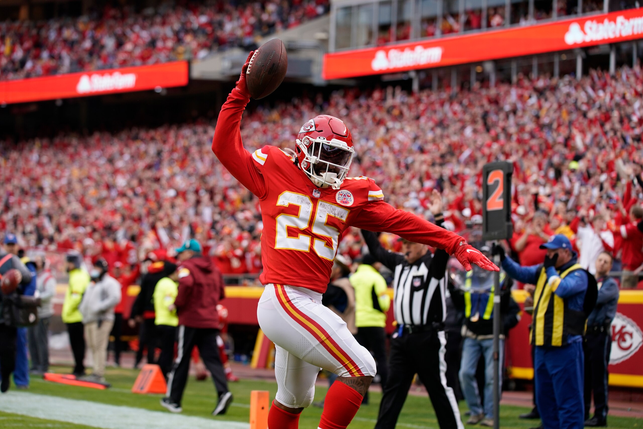 Kansas City Chiefs running back Clyde Edwards-Helaire celebrates after scoring during the first half of an NFL football game against the Pittsburgh Steelers Sunday, Dec. 26, 2021, in Kansas City, Mo. (AP Photo/Ed Zurga)