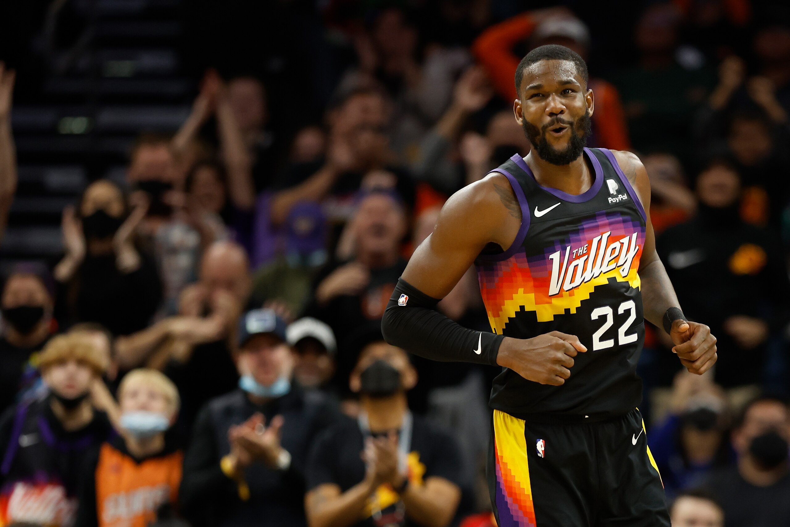 PHOENIX, ARIZONA - DECEMBER 23: Deandre Ayton #22 of the Phoenix Suns reacts after a slam dunk against the Oklahoma City Thunder during the second half of the NBA game at Footprint Center on December 23, 2021 in Phoenix, Arizona. The Suns defeated the Thunder 113-101.  NOTE TO USER: User expressly acknowledges and agrees that, by downloading and or using this photograph, User is consenting to the terms and conditions of the Getty Images License Agreement.  (Photo by Christian Petersen/Getty Images)