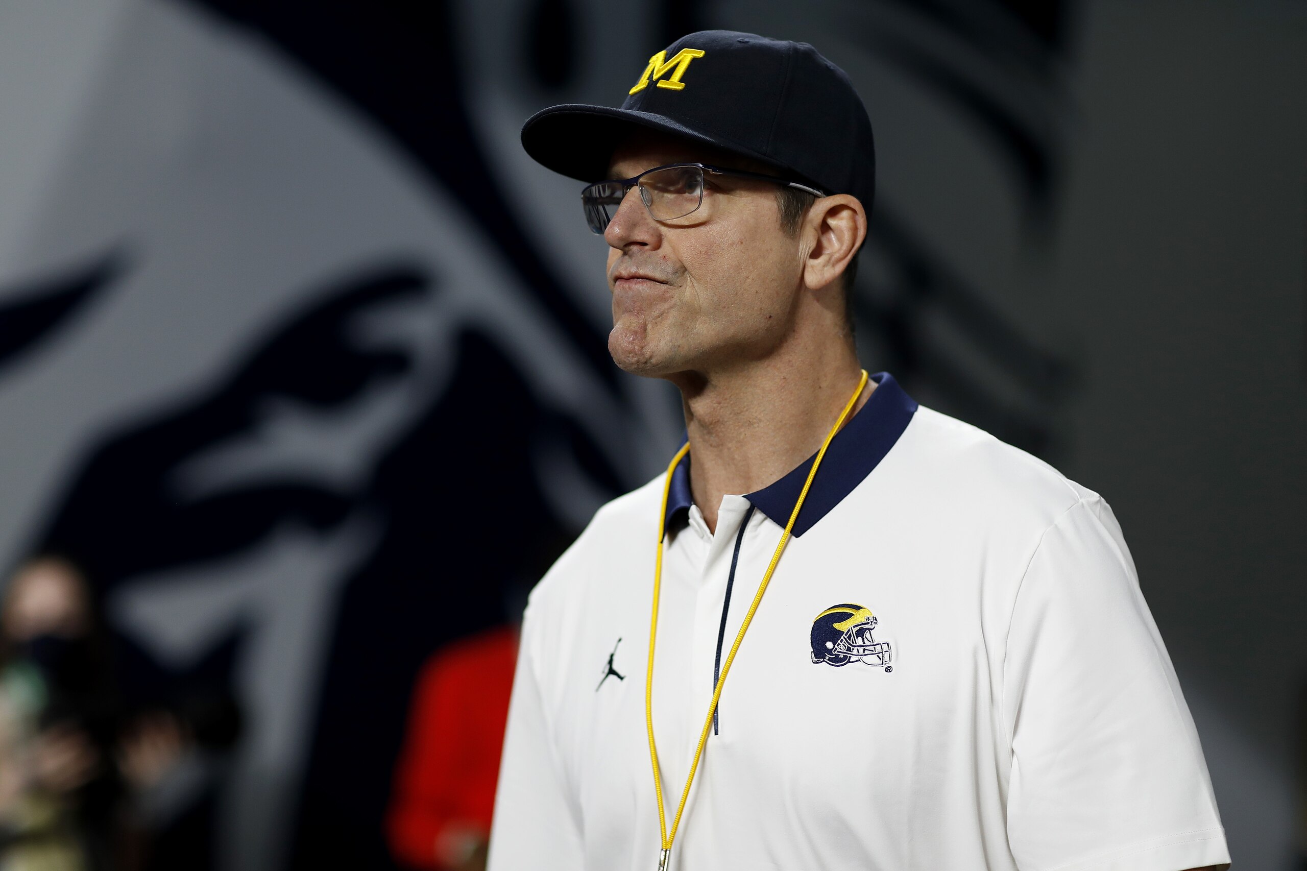 MIAMI GARDENS, FLORIDA - DECEMBER 31: Head Coach Jim Harbaugh of the Michigan Wolverines looks on before the game against the Georgia Bulldogs in the Capital One Orange Bowl for the College Football Playoff semifinal game at Hard Rock Stadium on December 31, 2021 in Miami Gardens, Florida. (Photo by Michael Reaves/Getty Images)