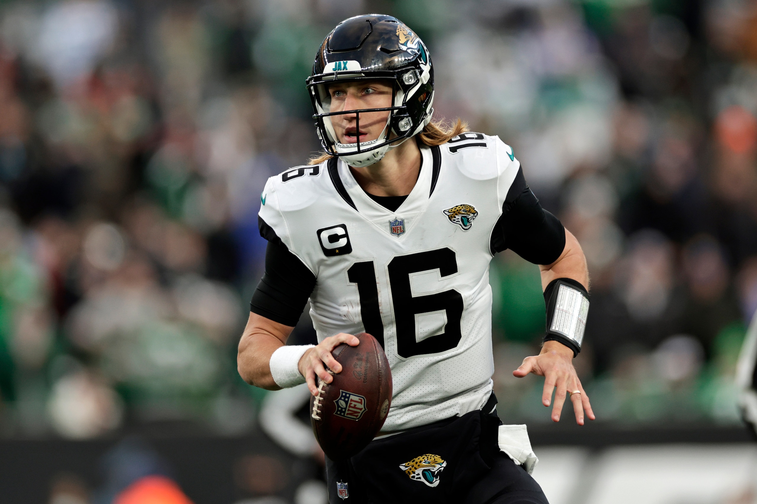 Jacksonville Jaguars quarterback Trevor Lawrence (16) passes against the New York Jets during an NFL football game, Sunday, Dec. 26, 2021, in East Rutherford, N.J. (AP Photo/Adam Hunger)