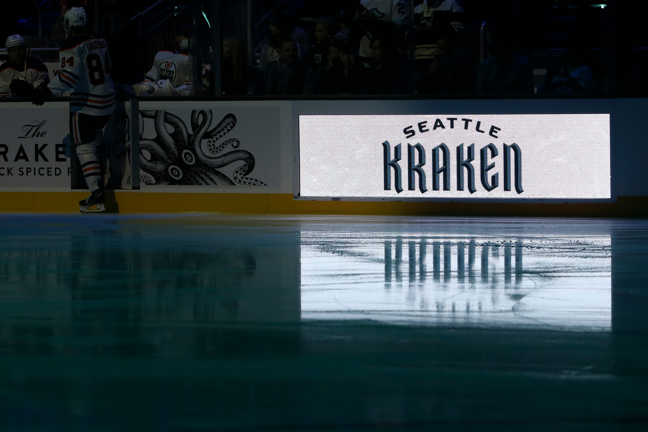 SEATTLE, WA - DECEMBER 18: Seattle Kraken logo on a sign during warms up before an NHL hockey game between the Edmonton Oilers and the Seattle Kraken  on December 18, 2021 at Climate Pledge Arena in Seattle, WA. (Photo by Jacob Snow/Icon Sportswire via Getty Images)