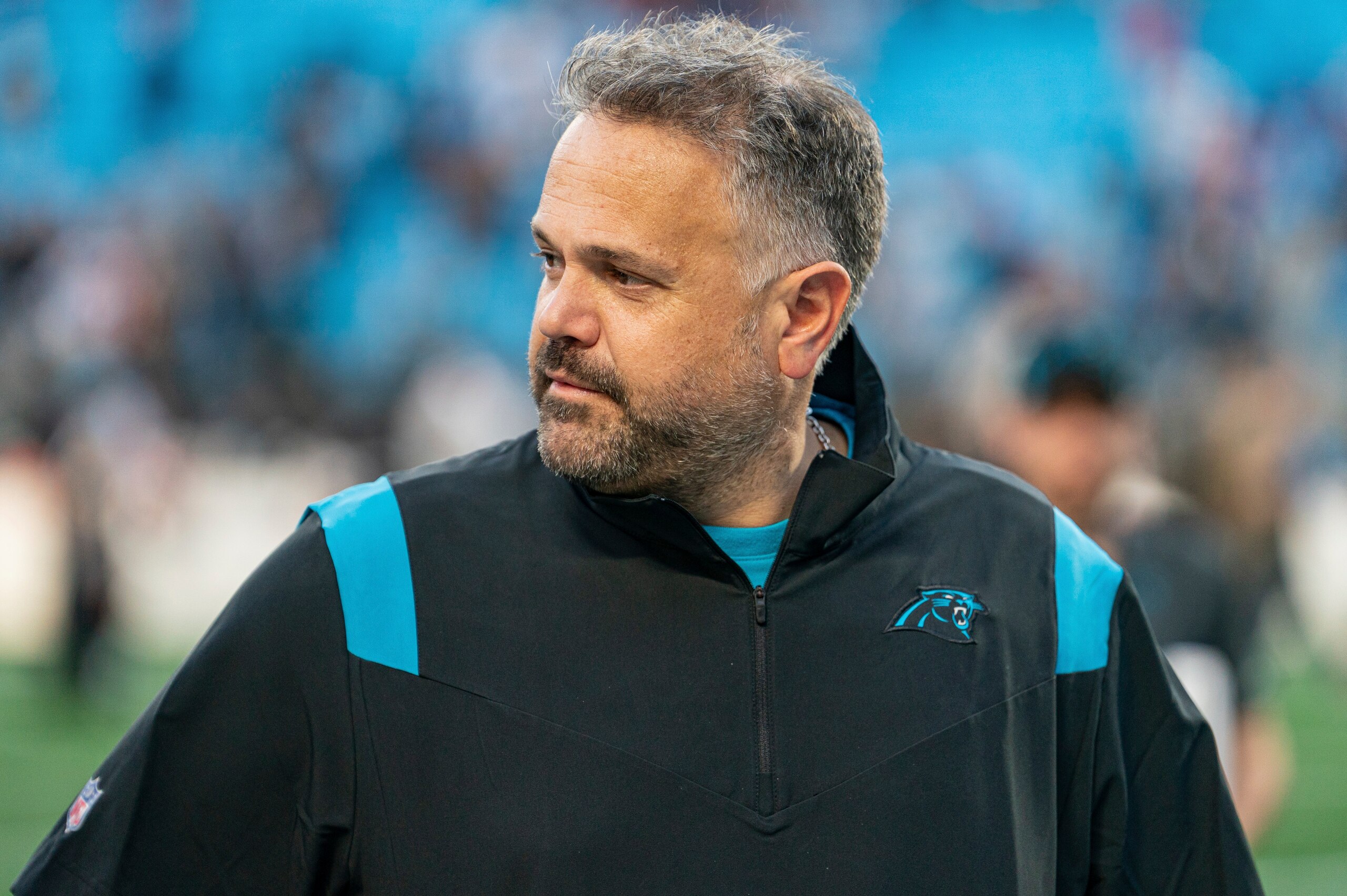 Carolina Panthers head coach Matt Rhule walks off the field after a loss to the Tampa Bay Buccaneers after an NFL football game Sunday, Dec. 26, 2021, in Charlotte, N.C. (AP Photo/Jacob Kupferman)