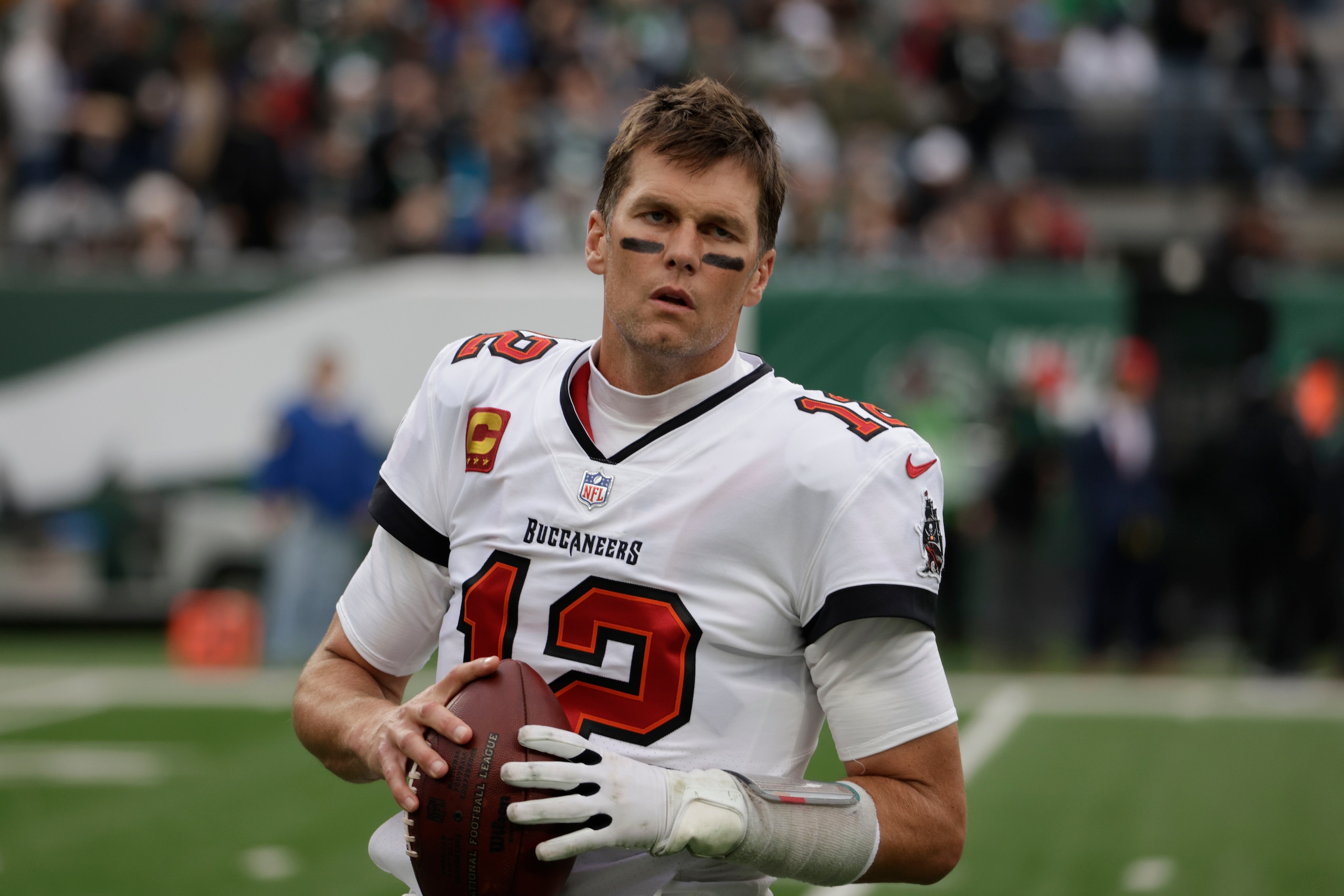 Tampa Bay Buccaneers quarterback Tom Brady warms-up before an NFL football game against the New York Jets, Sunday, Jan. 2, 2022, in East Rutherford, N.J. (AP Photo/Corey Sipkin)