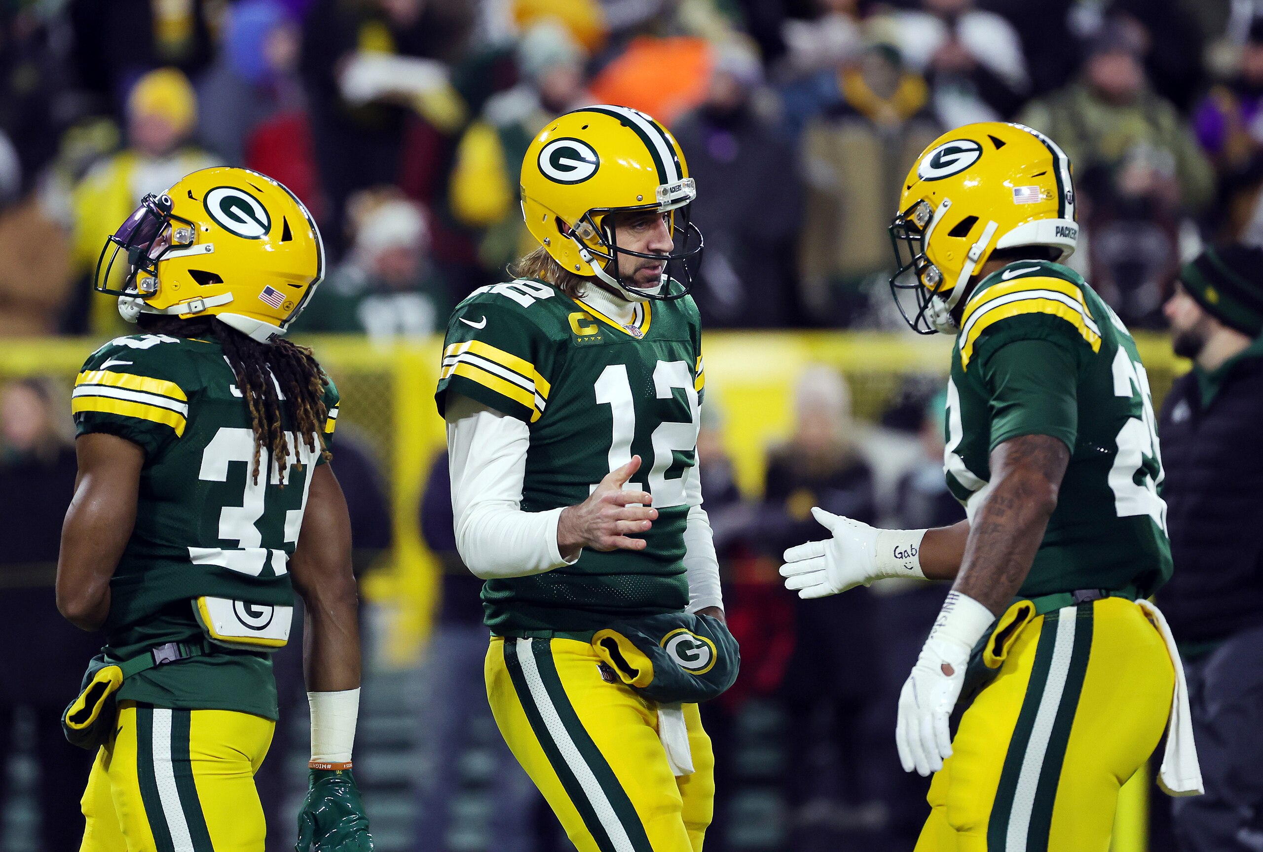 GREEN BAY, WISCONSIN - JANUARY 02:  Quarterback Aaron Rodgers #12 of the Green Bay Packers warms up prior to the game against the Minnesota Vikings at Lambeau Field on January 02, 2022 in Green Bay, Wisconsin. (Photo by Stacy Revere/Getty Images)