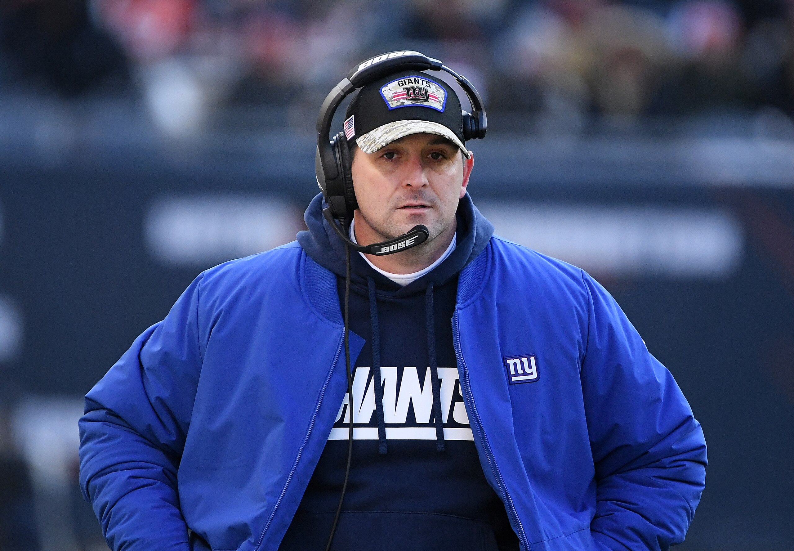 CHICAGO, ILLINOIS - JANUARY 02: Head Coach Joe Judge of the New York Giants looks on during the fourth quarter of the game against the Chicago Bears at Soldier Field on January 02, 2022 in Chicago, Illinois. (Photo by Quinn Harris/Getty Images)
