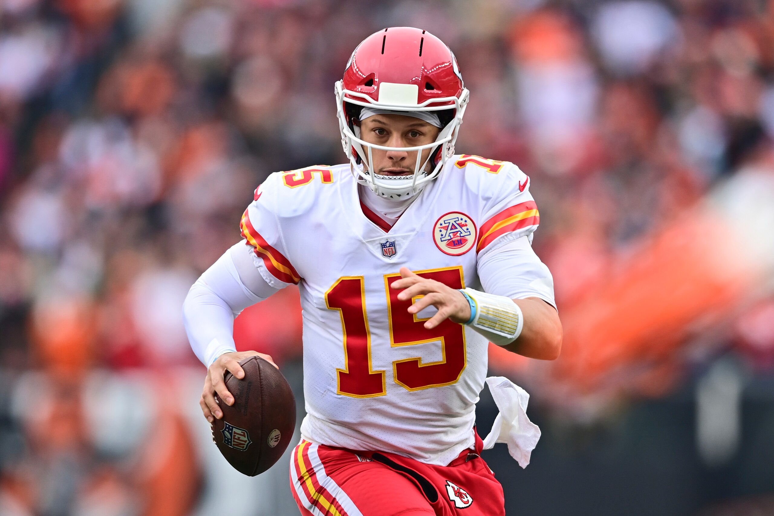 Kansas City Chiefs quarterback Patrick Mahomes (15) scrambles during the first half of an NFL football game against the Cincinnati Bengals, Sunday, Jan. 2, 2022, in Cincinnati. (AP Photo/David Dermer) Kansas City Chiefs quarterback Patrick Mahomes (15) scrambles during the first half of an NFL football game against the Cincinnati Bengals, Sunday, Jan. 2, 2022, in Cincinnati. (AP Photo/David Dermer)