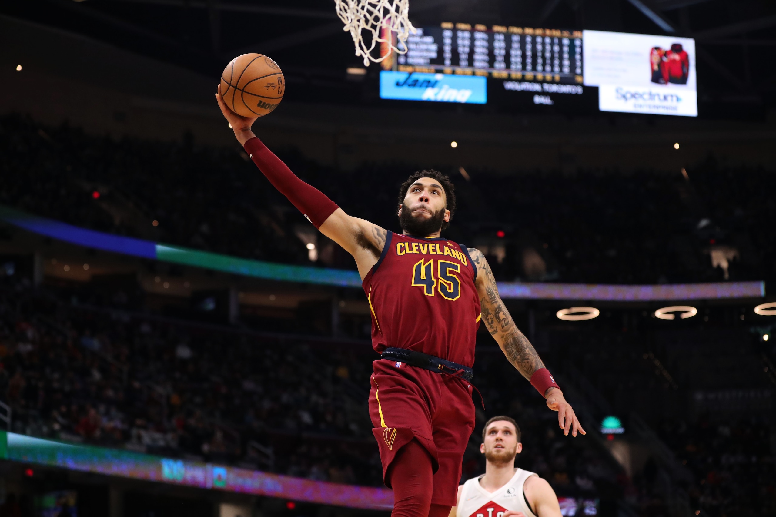 CLEVELAND, OH - DECEMBER 26: Denzel Valentine #45 of the Cleveland Cavaliers shoots the ball during the game against the Toronto Raptors on December 26, 2021 at Rocket Mortgage FieldHouse in Cleveland, Ohio. NOTE TO USER: User expressly acknowledges and agrees that, by downloading and/or using this Photograph, user is consenting to the terms and conditions of the Getty Images License Agreement. Mandatory Copyright Notice: Copyright 2021 NBAE (Photo by Lauren Bacho/NBAE via Getty Images)