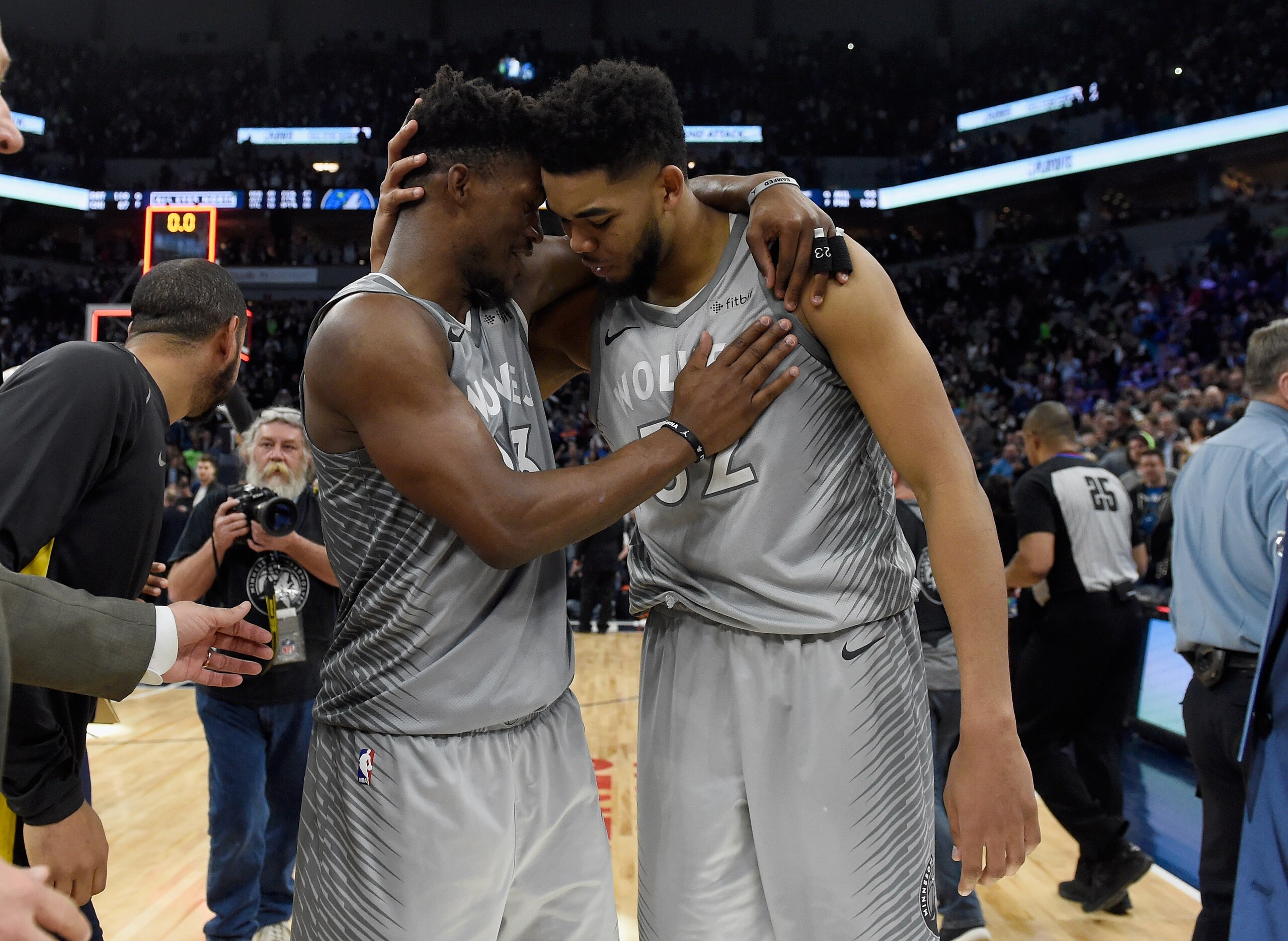 MINNEAPOLIS, MN - APRIL 11: Jimmy Butler #23 and Karl-Anthony Towns #32 of the Minnesota Timberwolves celebrate after winning the game against the Denver Nuggets on April 11, 2018 at the Target Center in Minneapolis, Minnesota. The Timberwolves defeated the Nuggets 112-106. NOTE TO USER: User expressly acknowledges and agrees that, by downloading and or using this Photograph, user is consenting to the terms and conditions of the Getty Images License Agreement. (Photo by Hannah Foslien/Getty Images)