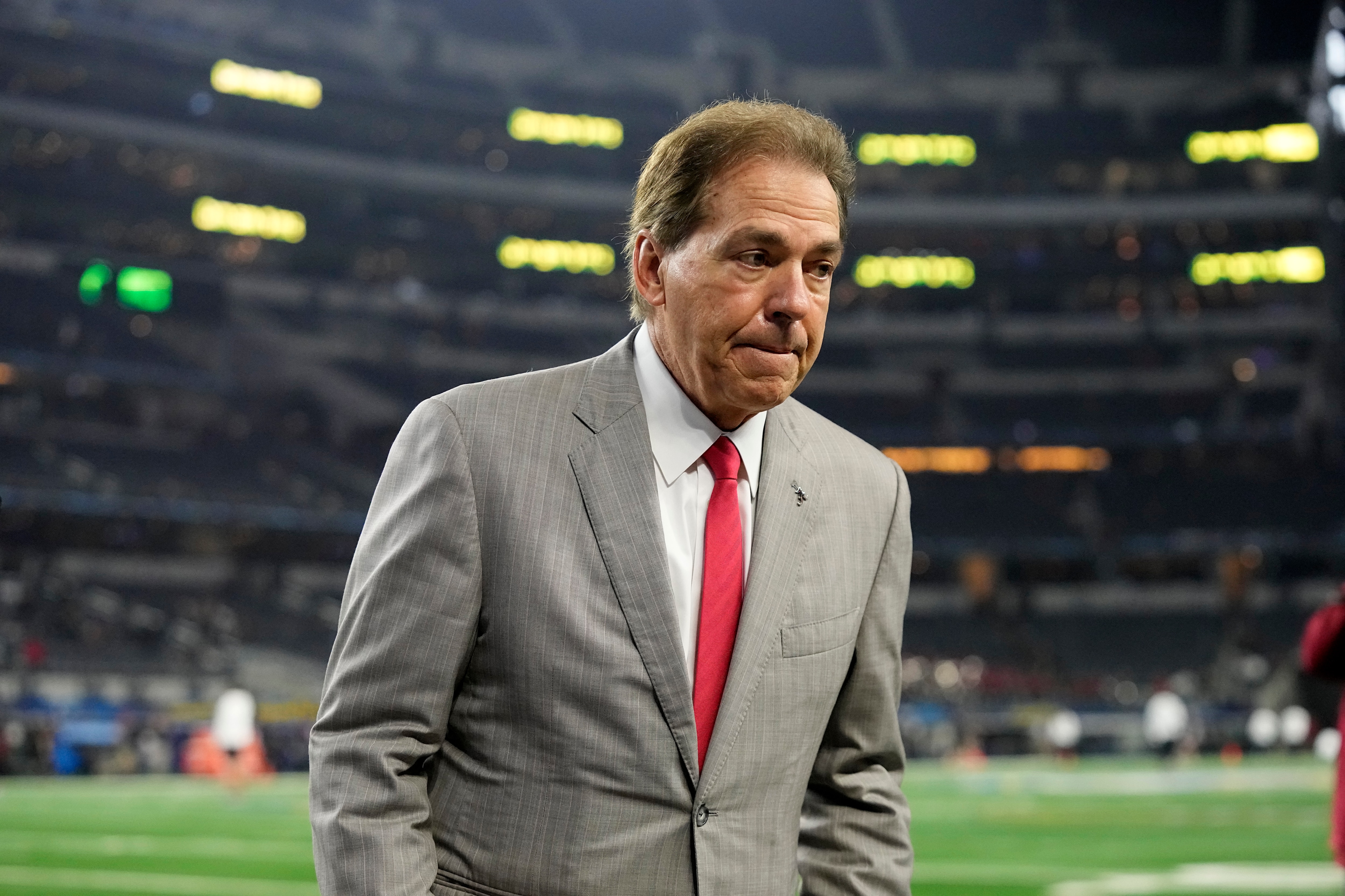 Alabama coach Nick Saban walks off the field before the Cotton Bowl NCAA College Football Playoff semifinal game, Friday, Dec. 31, 2022, in Arlington, Texas. (AP Photo/Jeffrey McWhorter)