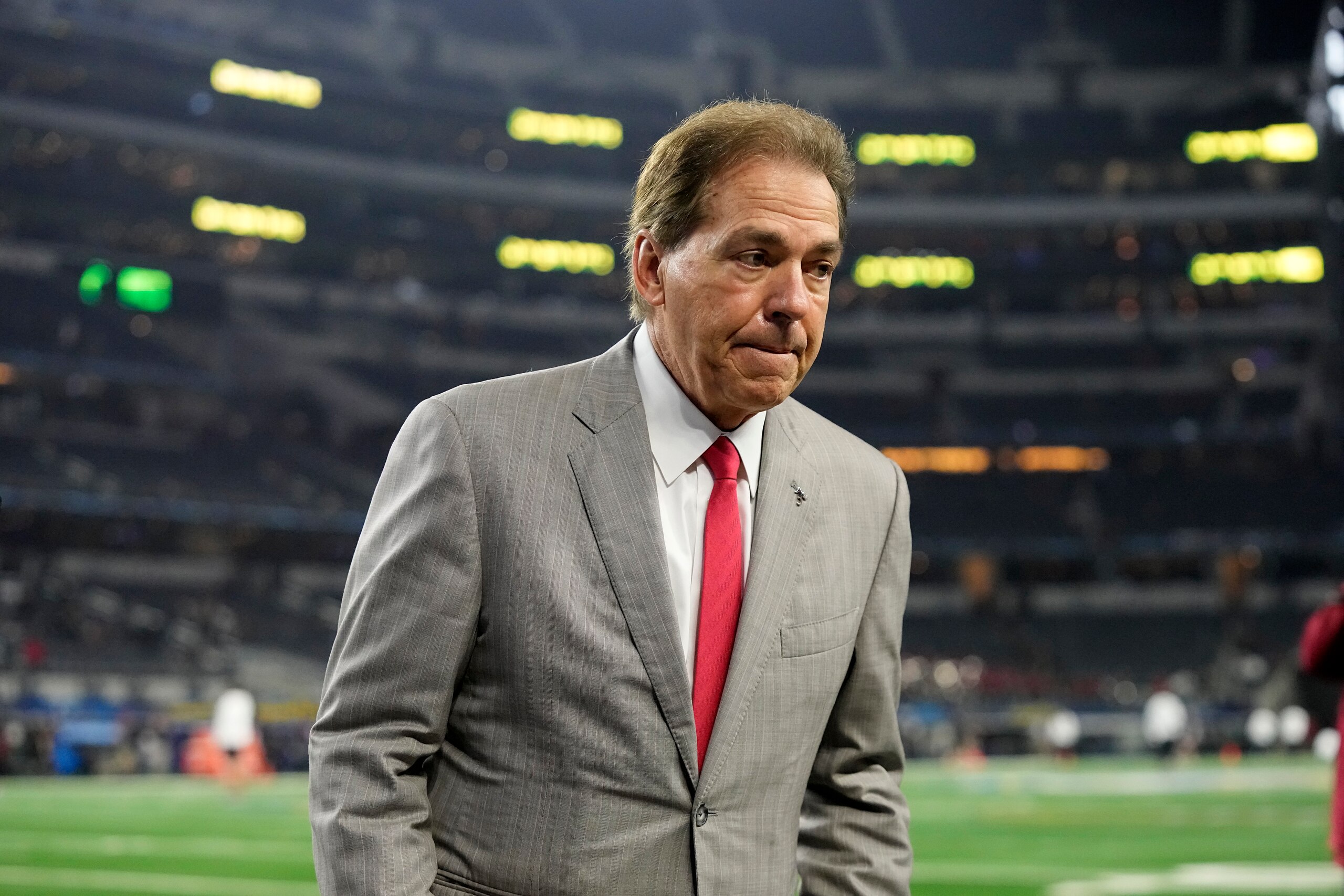 Alabama coach Nick Saban walks off the field before the Cotton Bowl NCAA College Football Playoff semifinal game, Friday, Dec. 31, 2022, in Arlington, Texas. (AP Photo/Jeffrey McWhorter)