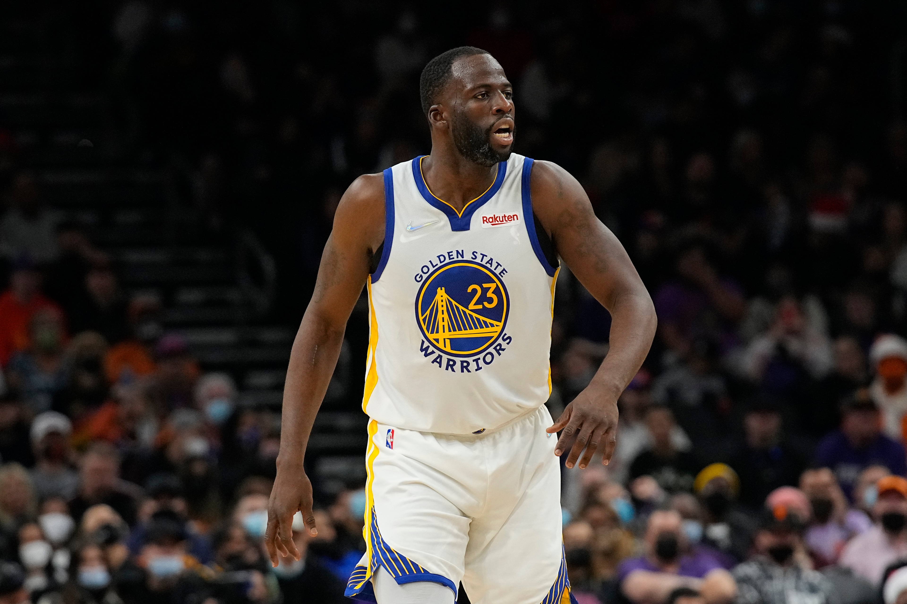 Golden State Warriors forward Draymond Green (23) during the first half of an NBA basketball game against the Phoenix Suns, Saturday, Dec. 25, 2021, in Phoenix. (AP Photo/Rick Scuteri) Golden State Warriors forward Draymond Green (23) during the first half of an NBA basketball game against the Phoenix Suns, Saturday, Dec. 25, 2021, in Phoenix. (AP Photo/Rick Scuteri)