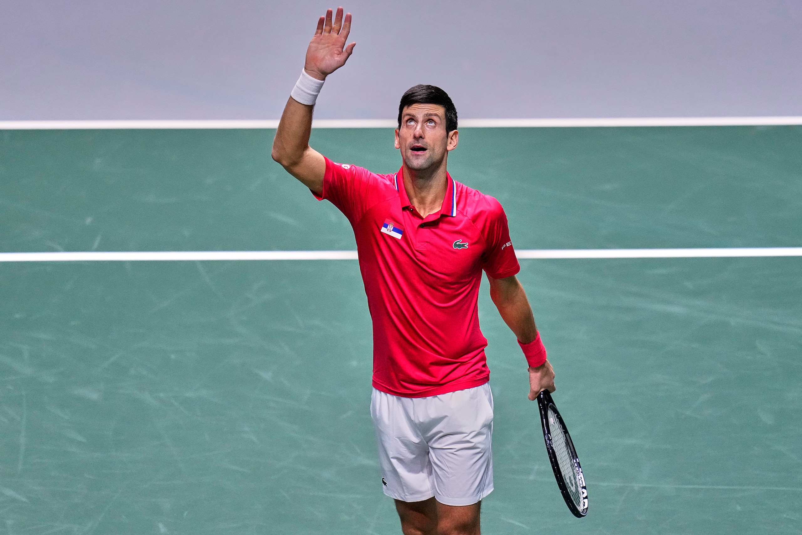 Serbia's Novak Djokovic celebrates his victory over Kazakhstan's Alexander Bublik during a Davis Cup quarter final match between Serbia and Kazakhstan at the Madrid Arena stadium in Madrid, Spain, Wednesday, Dec. 1, 2021. (AP Photo/Manu Fernandez)