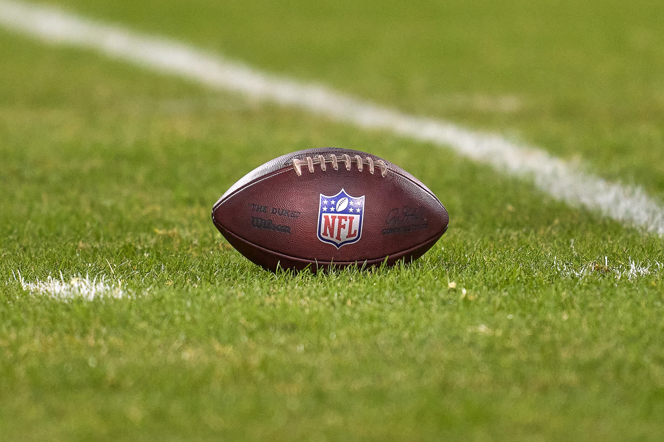 CHICAGO, IL - DECEMBER 20: A detail view of the NFL logo crest is seen on a football on the field during a game between the Chicago Bears and the Minnesota Vikings on December 20, 2021, at Soldier Field in Chicago, IL. (Photo by Robin Alam/Icon Sportswire via Getty Images) CHICAGO, IL - DECEMBER 20: A detail view of the NFL logo crest is seen on a football on the field during a game between the Chicago Bears and the Minnesota Vikings on December 20, 2021, at Soldier Field in Chicago, IL. (Photo by Robin Alam/Icon Sportswire via Getty Images)