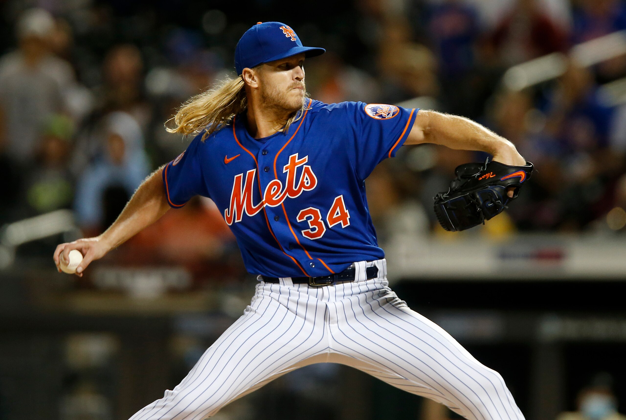 NEW YORK, NEW YORK - SEPTEMBER 28:  Noah Syndergaard #34 of the New York Mets pitches in the first inning of game 2 of a double header against the Miami Marlins at Citi Field on September 28, 2021 in New York City. (Photo by Jim McIsaac/Getty Images)
