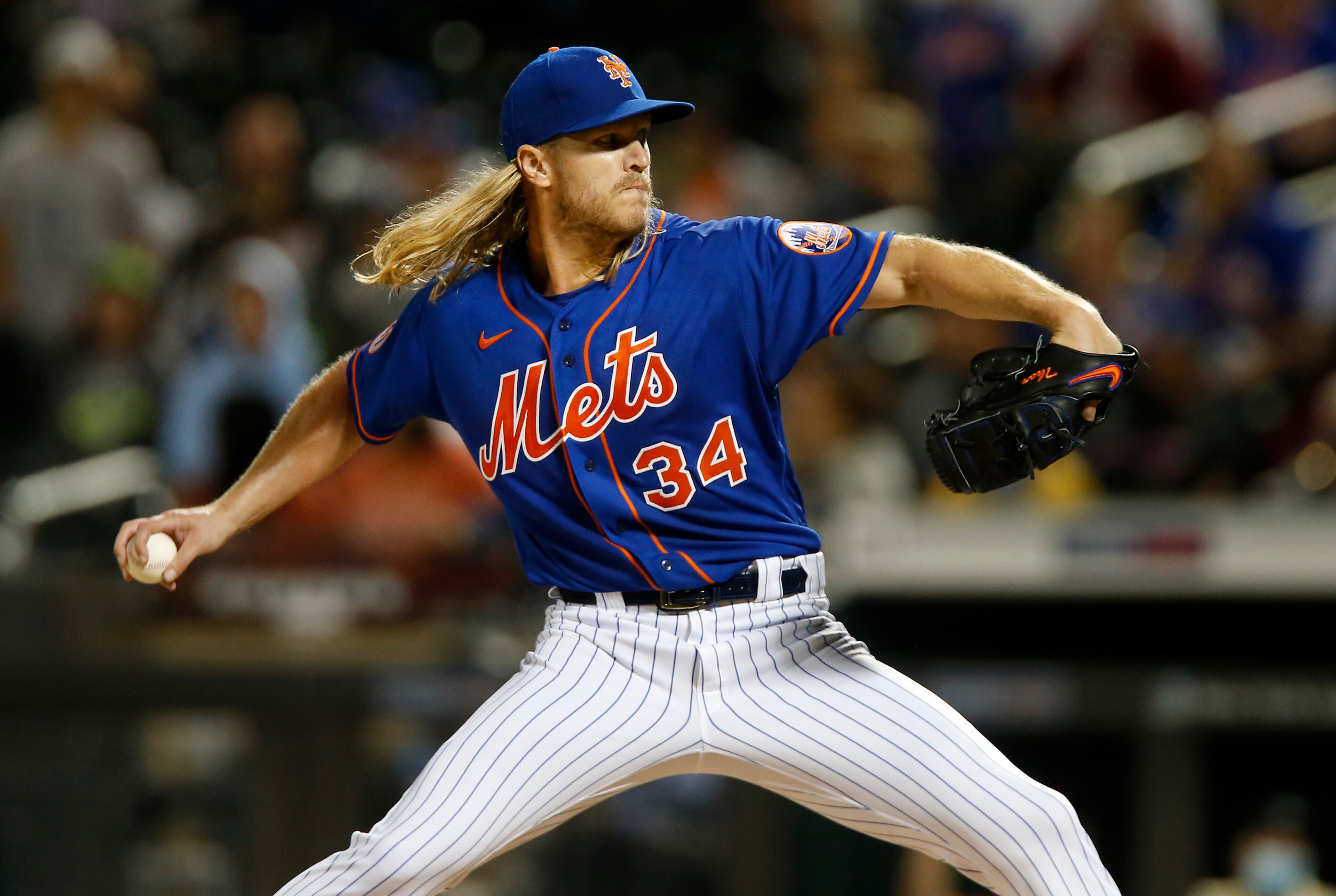 NEW YORK, NEW YORK - SEPTEMBER 28:  Noah Syndergaard #34 of the New York Mets pitches in the first inning of game 2 of a double header against the Miami Marlins at Citi Field on September 28, 2021 in New York City. (Photo by Jim McIsaac/Getty Images)