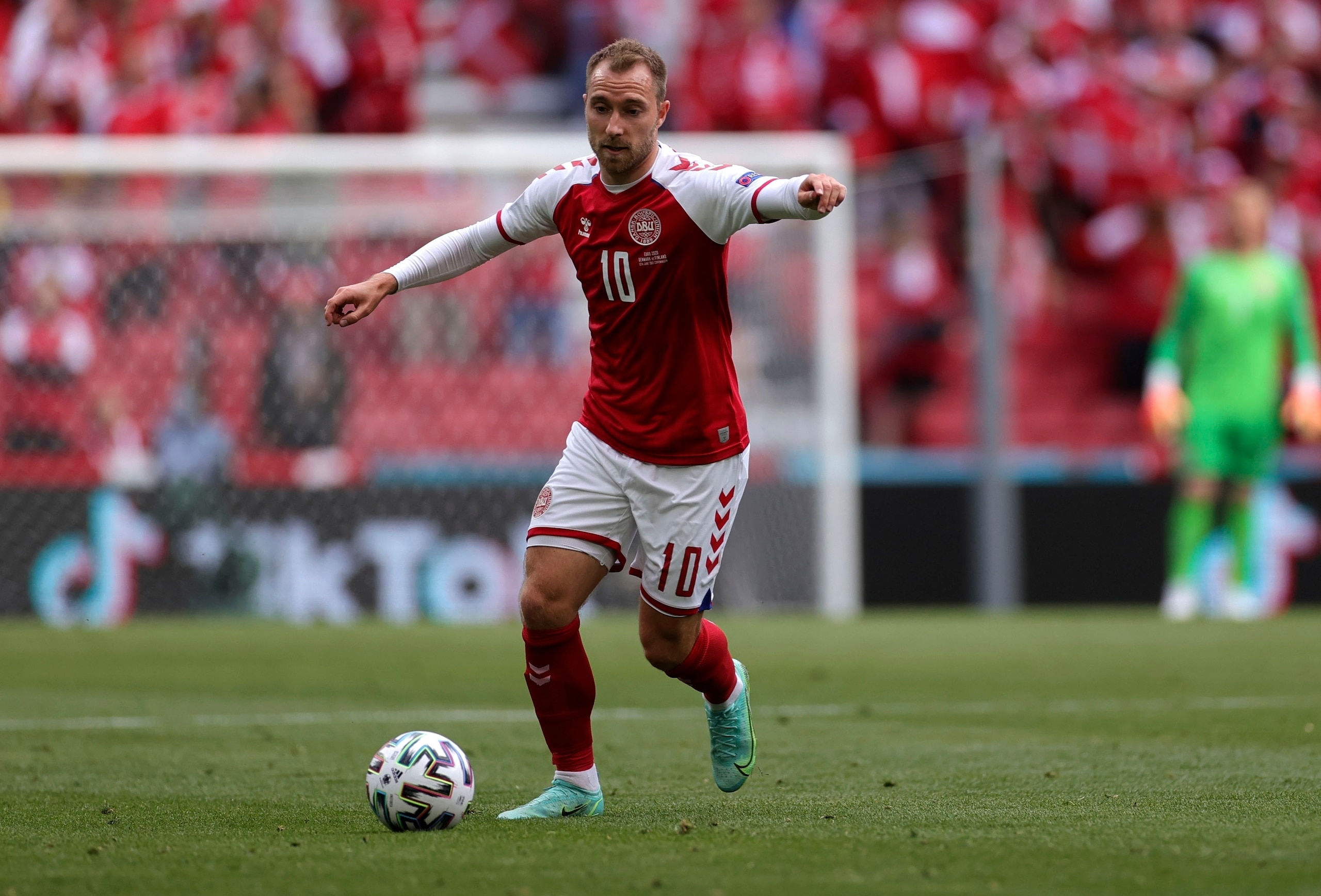 FILE - In this file photo dated Saturday, June 12, 2021, Denmark's Christian Eriksen controls the ball during the Euro 2020 soccer championship group B match against Finland at Parken stadium in Copenhagen, Denmark. Christian Eriksen has been discharged from the hospital nearly a week after collapsing on the field during a Euro 2020 soccer match, according to a statement from Danish soccer federation Friday June 18, 2021. (Wolfgang Rattay/Pool via AP)