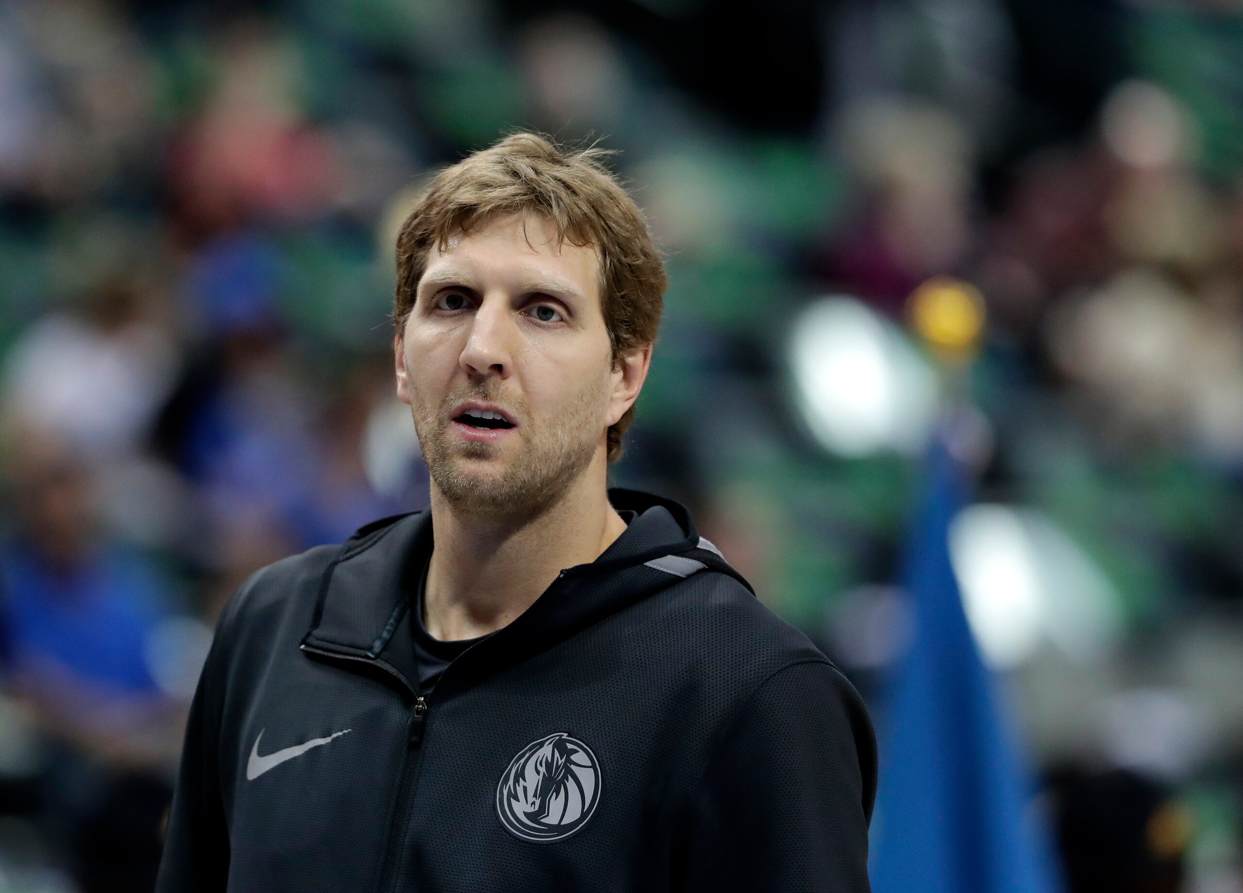 Dallas Mavericks' Dirk Nowitzki participates in warmup before a NBA basketball game against the Portland Trail Blazers in Dallas, Tuesday, April 3, 2018. (AP Photo/Tony Gutierrez)