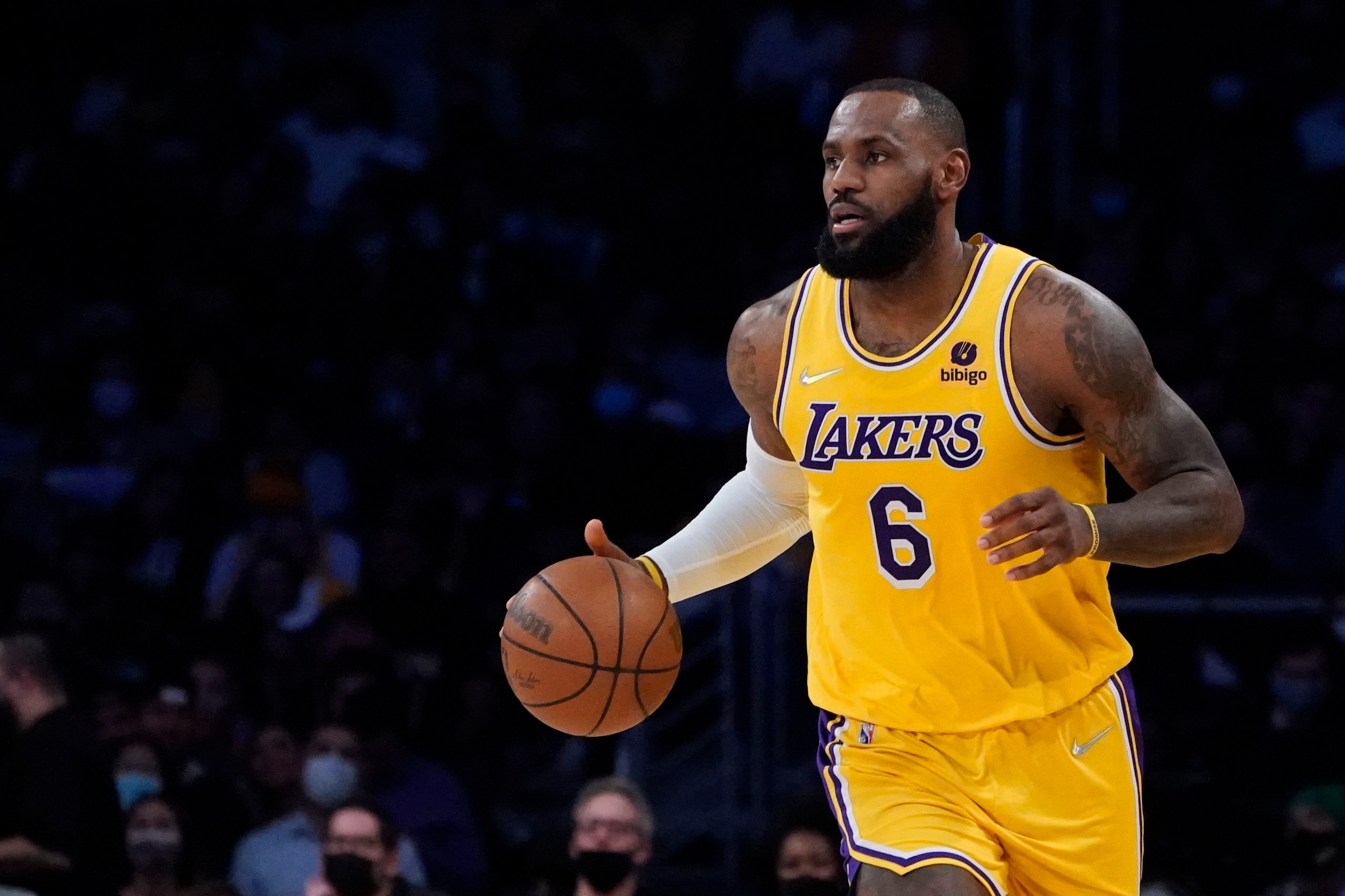 Los Angeles Lakers forward LeBron James (6) dribbles during the first half of an NBA basketball game against the Sacramento Kings Tuesday, Jan. 4, 2022, in Los Angeles. (AP Photo/Marcio Jose Sanchez) Los Angeles Lakers forward LeBron James (6) dribbles during the first half of an NBA basketball game against the Sacramento Kings Tuesday, Jan. 4, 2022, in Los Angeles. (AP Photo/Marcio Jose Sanchez)