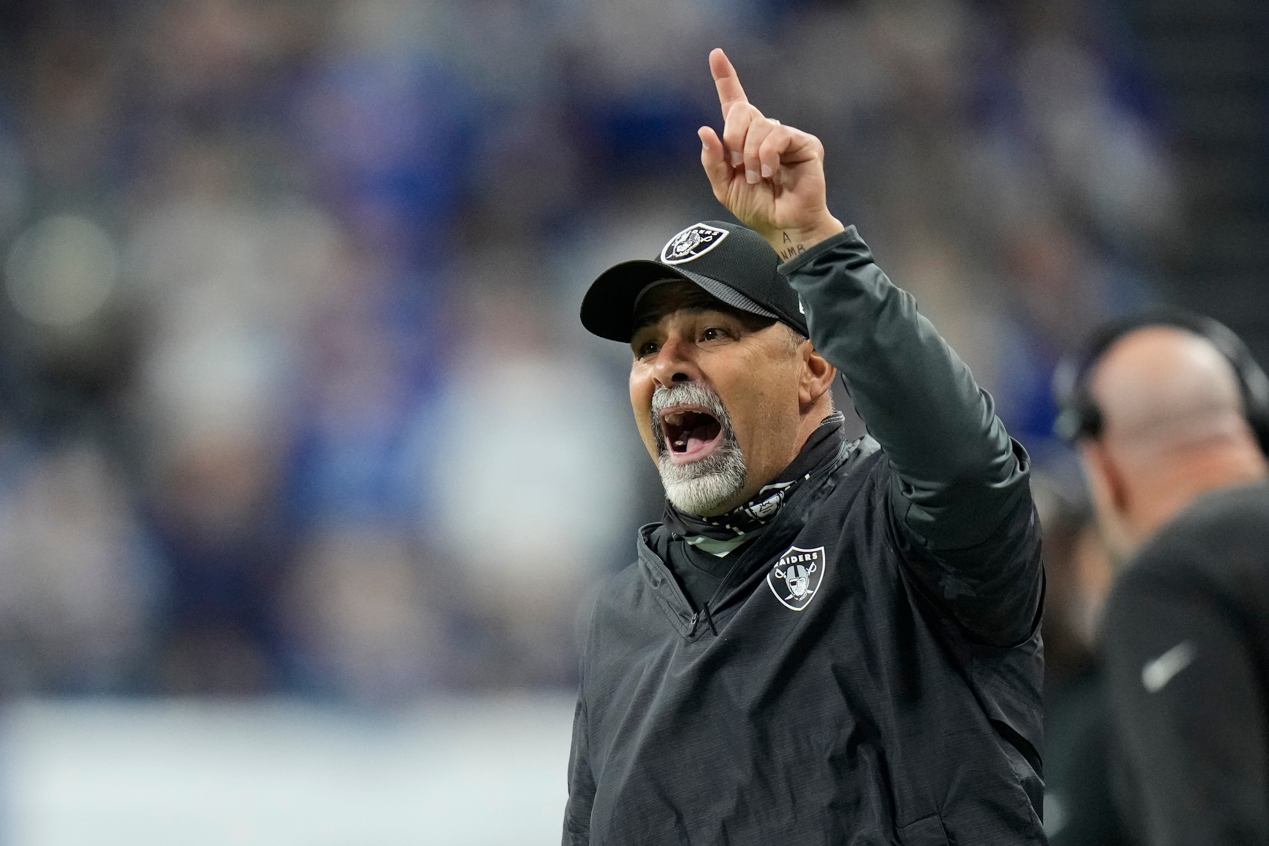 Las Vegas Raiders interim head coach Rich Bisaccia reacts on the sideline during the first half of an NFL football game against the Indianapolis Colts, Sunday, Jan. 2, 2022, in Indianapolis. (AP Photo/AJ Mast)