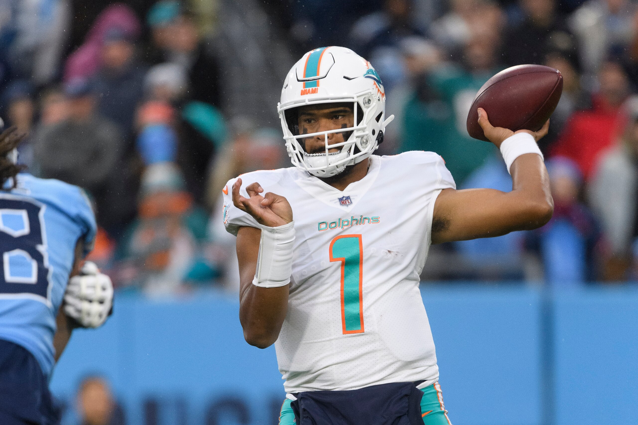 Miami Dolphins quarterback Tua Tagovailoa (1) plays during an NFL football game against the Tennessee Titans, Sunday, Jan. 2, 2022, in Nashville, Tenn. (AP Photo/John Amis)