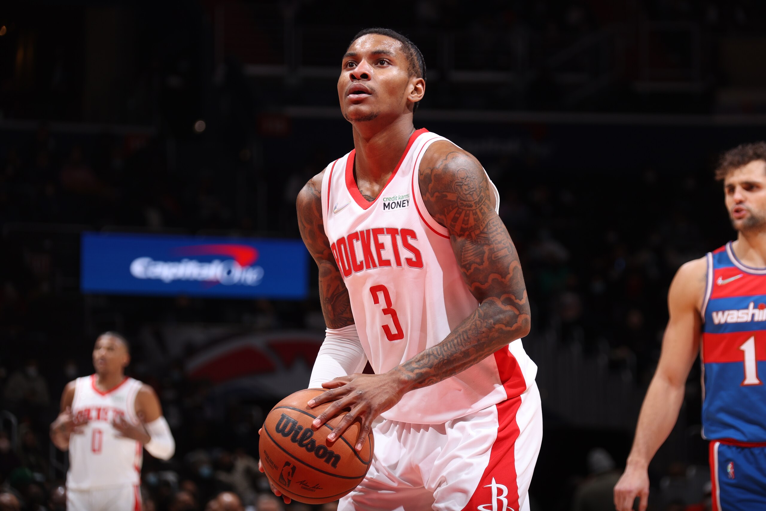 WASHINGTON, DC - JANUARY 5: Kevin Porter Jr. #3 of the Houston Rockets shoots a three point basket during the game against the Washington Wizards on January 5, 2022 at Capital One Arena in Washington, DC. NOTE TO USER: User expressly acknowledges and agrees that, by downloading and or using this Photograph, user is consenting to the terms and conditions of the Getty Images License Agreement. Mandatory Copyright Notice: Copyright 2021 NBAE (Photo by Stephen Gosling/NBAE via Getty Images) WASHINGTON, DC - JANUARY 5: Kevin Porter Jr. #3 of the Houston Rockets shoots a three point basket during the game against the Washington Wizards on January 5, 2022 at Capital One Arena in Washington, DC. NOTE TO USER: User expressly acknowledges and agrees that, by downloading and or using this Photograph, user is consenting to the terms and conditions of the Getty Images License Agreement. Mandatory Copyright Notice: Copyright 2021 NBAE (Photo by Stephen Gosling/NBAE via Getty Images)