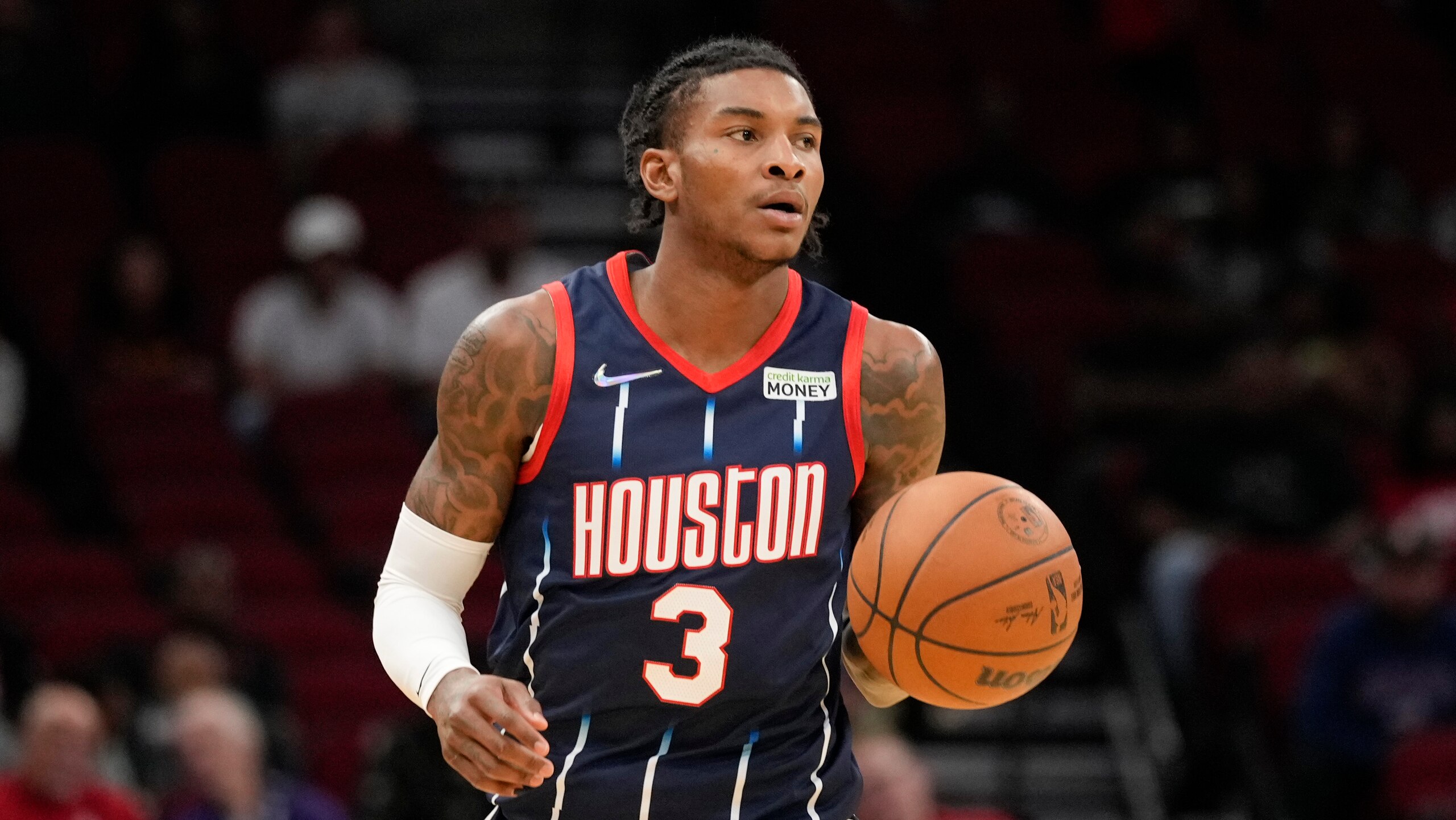 Houston Rockets guard Kevin Porter Jr. dribbles during the first half of an NBA basketball game against the Orlando Magic, Friday, Dec. 3, 2021, in Houston. (AP Photo/Eric Christian Smith)
