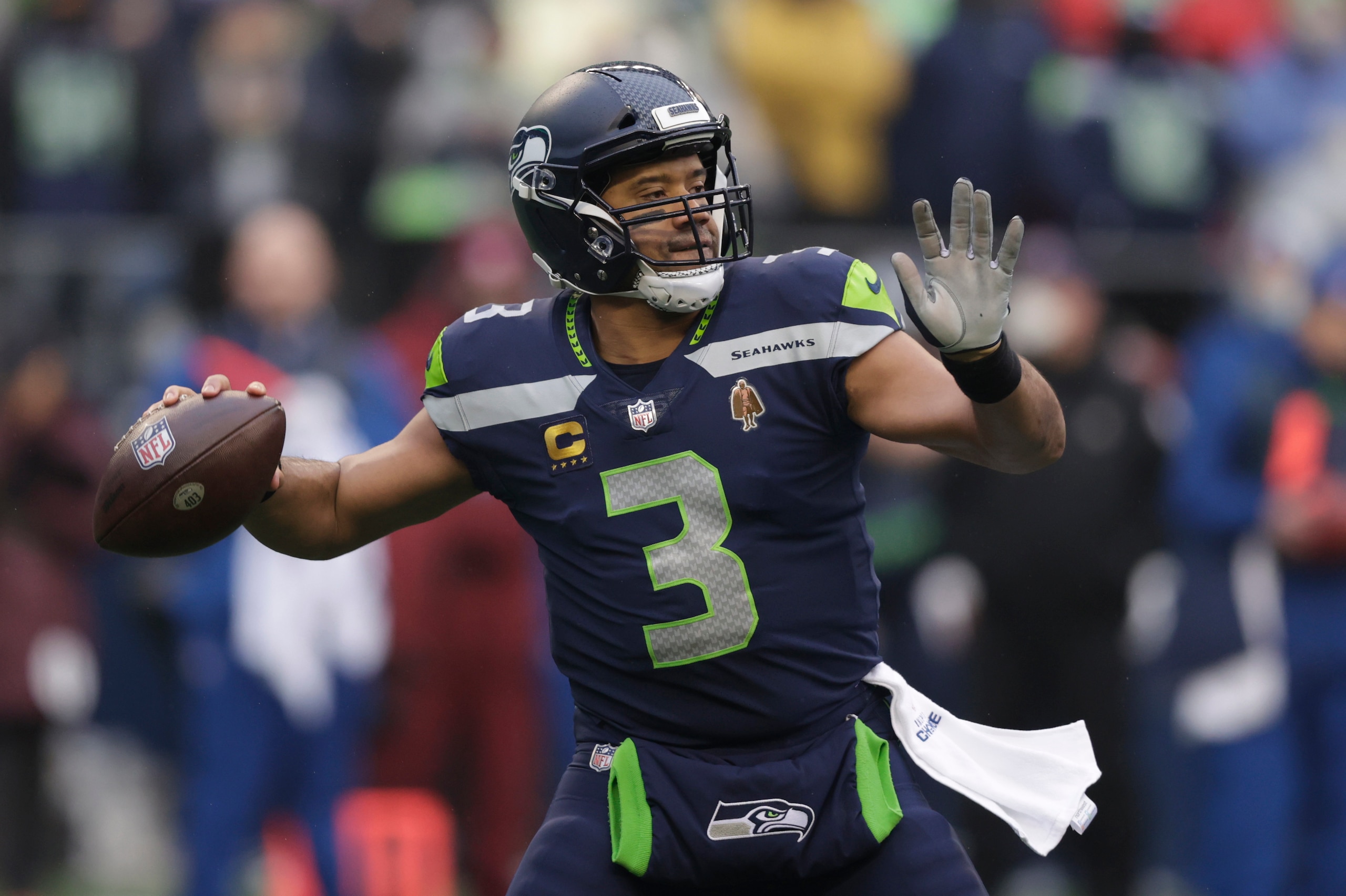 Seattle Seahawks quarterback Russell Wilson passes against the Detroit Lions during the first half of an NFL football game, Sunday, Jan. 2, 2022, in Seattle. (AP Photo/John Froschauer)