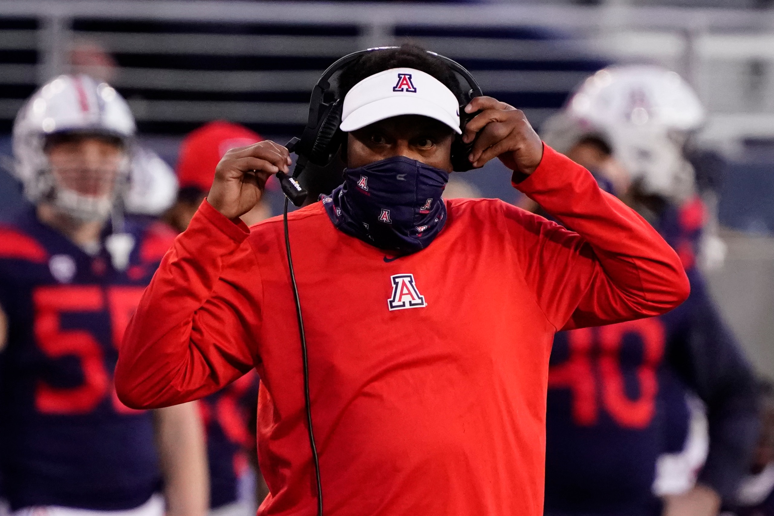 Arizona head coach Kevin Sumlin in the first half during an NCAA college football game against Arizona State, Friday, Dec. 11, 2020, in Tucson, Ariz. Arizona fired Sumlin on Saturday, Dec. 12, a day after a 70-7 loss to Arizona State extended the Wildcats' losing streak to a record 12 games over two seasons. (AP Photo/Rick Scuteri) Arizona head coach Kevin Sumlin in the first half during an NCAA college football game against Arizona State, Friday, Dec. 11, 2020, in Tucson, Ariz. Arizona fired Sumlin on Saturday, Dec. 12, a day after a 70-7 loss to Arizona State extended the Wildcats' losing streak to a record 12 games over two seasons. (AP Photo/Rick Scuteri)