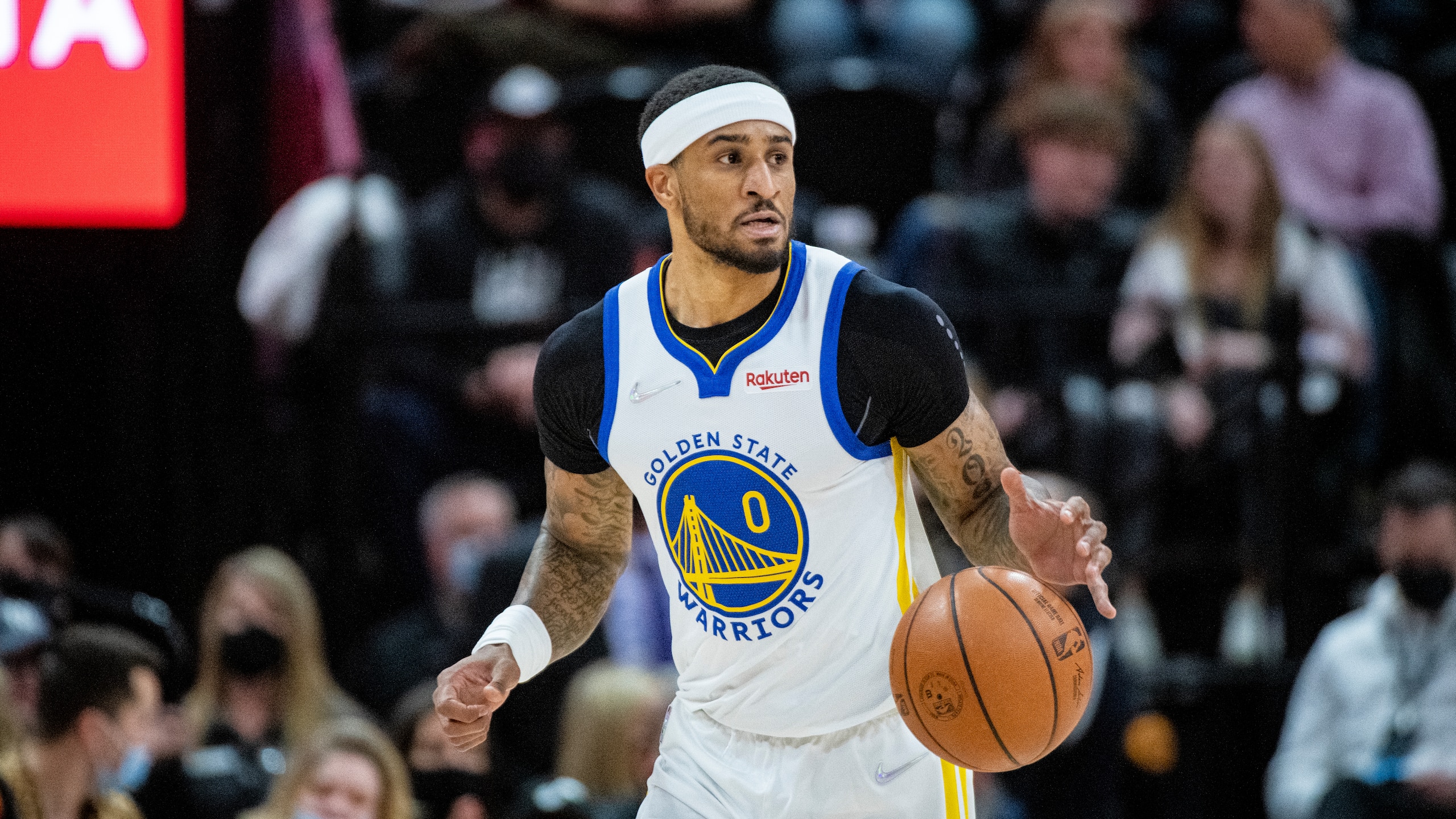 Golden State Warriors guard Gary Payton II (0) brings the ball up the court in the first half during an NBA basketball game against the Utah Jazz on Saturday, Jan. 1, 2022, in Salt Lake City. (AP Photo/Isaac Hale) Golden State Warriors guard Gary Payton II (0) brings the ball up the court in the first half during an NBA basketball game against the Utah Jazz on Saturday, Jan. 1, 2022, in Salt Lake City. (AP Photo/Isaac Hale)