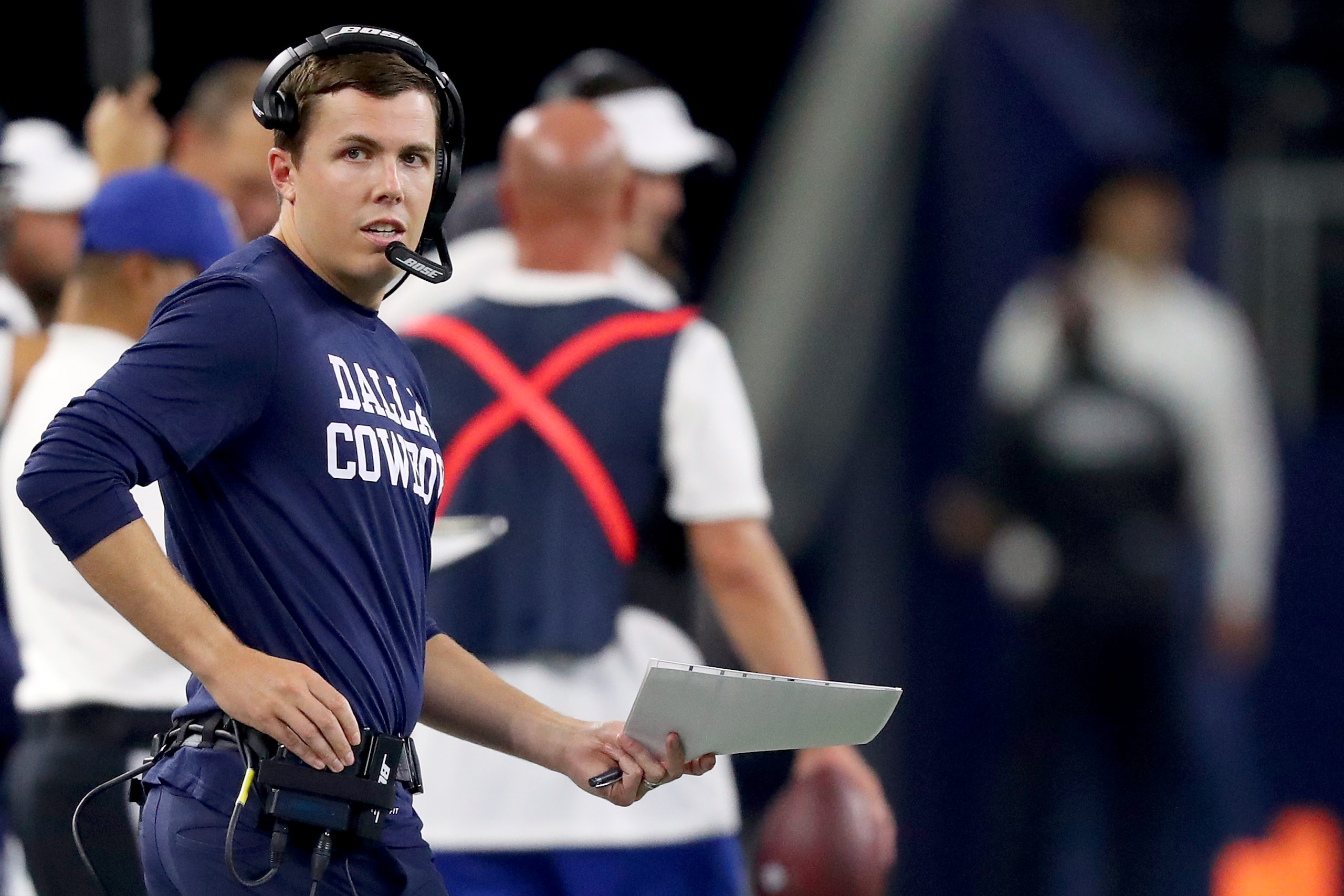 ARLINGTON, TEXAS - AUGUST 29: Offensive coordinator Kellen Moore of the Dallas Cowboys on the sideline against the Tampa Bay Buccaneers in the fourth quarter of a NFL preseason game at AT&T Stadium on August 29, 2019 in Arlington, Texas. (Photo by Tom Pennington/Getty Images)