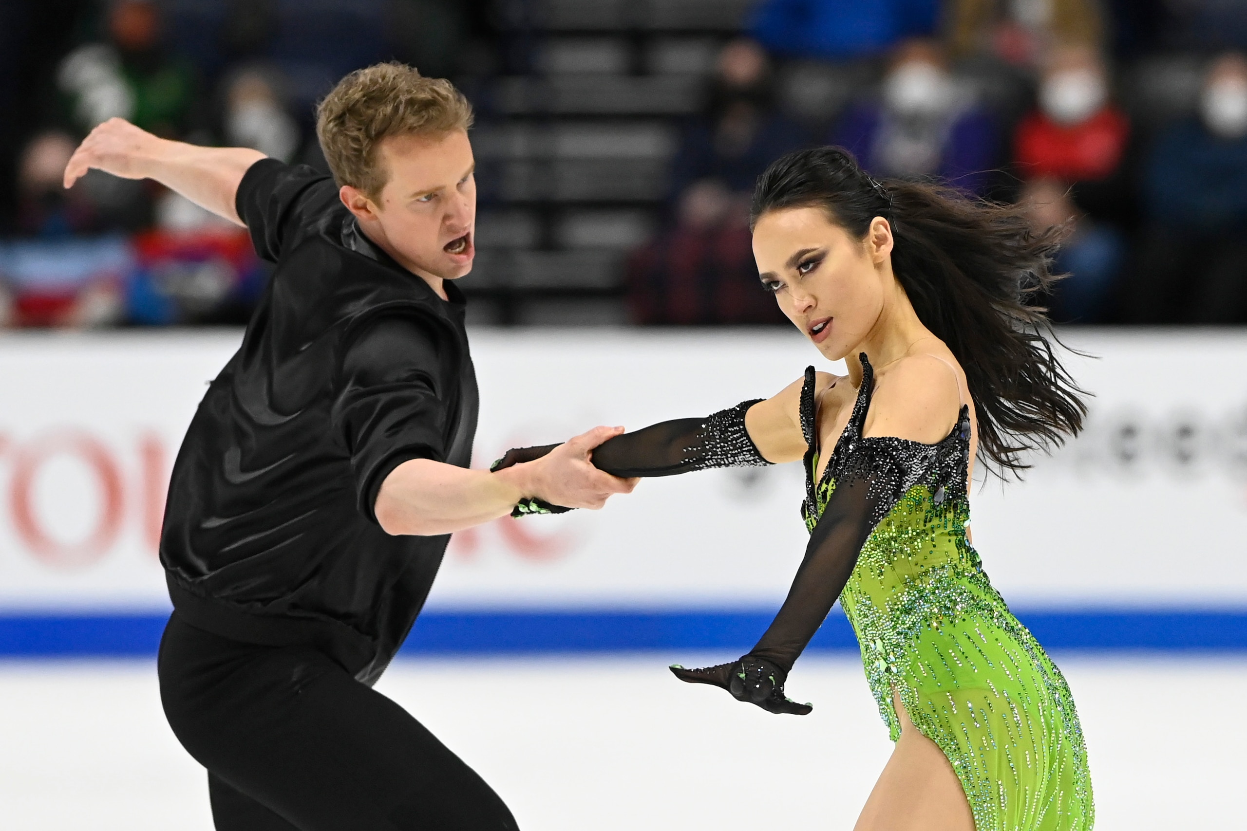 Madison Chock and Evan Bates compete in the rhythm dance program during the U.S. Figure Skating Championships Friday, Jan. 7, 2022, in Nashville, Tenn. (AP Photo/Mark Zaleski)