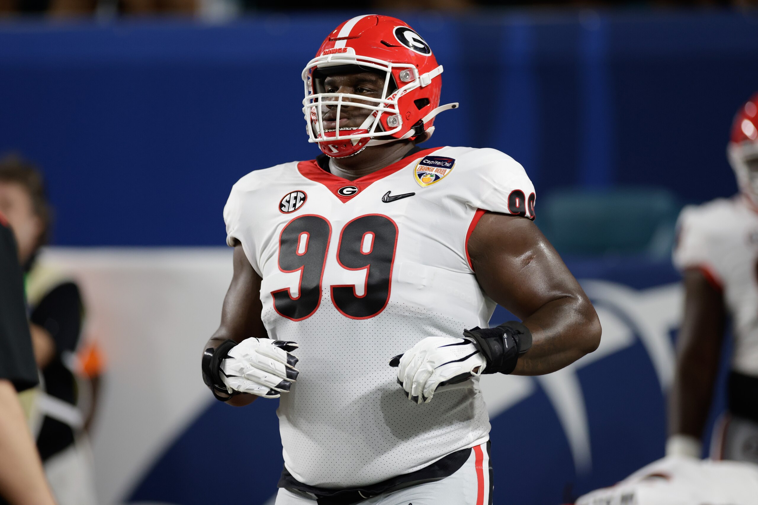 MIAMI GARDENS, FL - DECEMBER 31: Georgia Bulldogs defensive lineman Jordan Davis (99) during the Capital One Orange Bowl game between the Georgia Bulldogs and the Michigan Wolverines on December 31, 2021 at Hard Rock Stadium in Miami Gardens, Fl.  (Photo by David Rosenblum/Icon Sportswire via Getty Images)