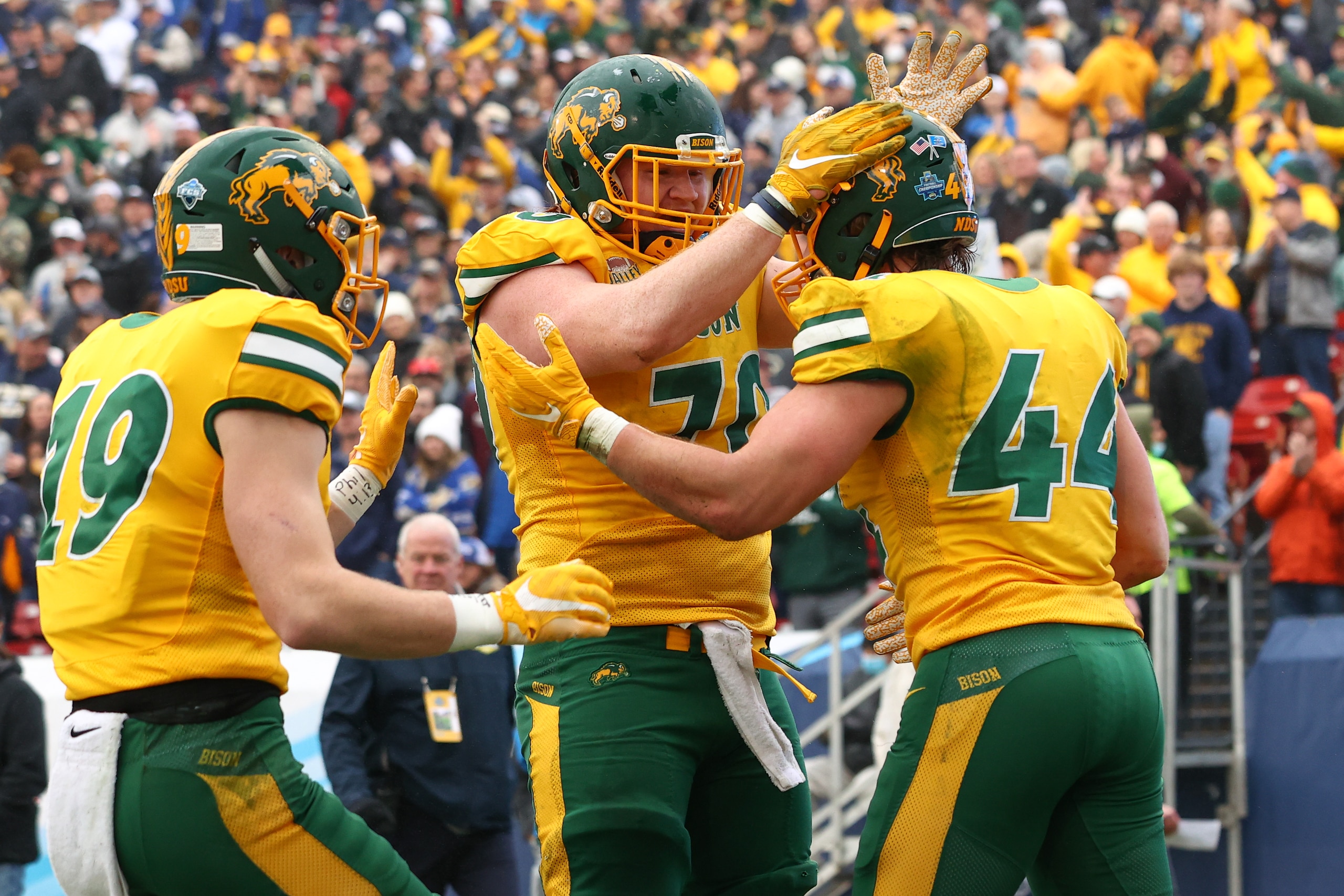 FRISCO, TX - JANUARY 08: Cody Mauch #70 and Hunter Luepke #44 of the North Dakota State Bison celebrate a touchdown against the Montana State Bobcats during the Division I FCS Football Championship held at Toyota Stadium on January 8, 2022 in Frisco, Texas. (Photo by C. Morgan Engel/NCAA Photos via Getty Images)