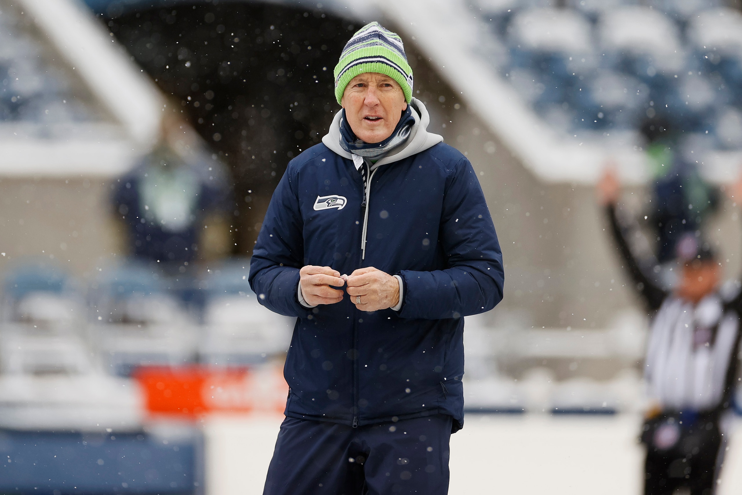 SEATTLE, WASHINGTON - DECEMBER 26: Head coach Pete Carroll of the Seattle Seahawks looks on during warm-ups before the game against the Chicago Bears at Lumen Field on December 26, 2021 in Seattle, Washington. (Photo by Steph Chambers/Getty Images)