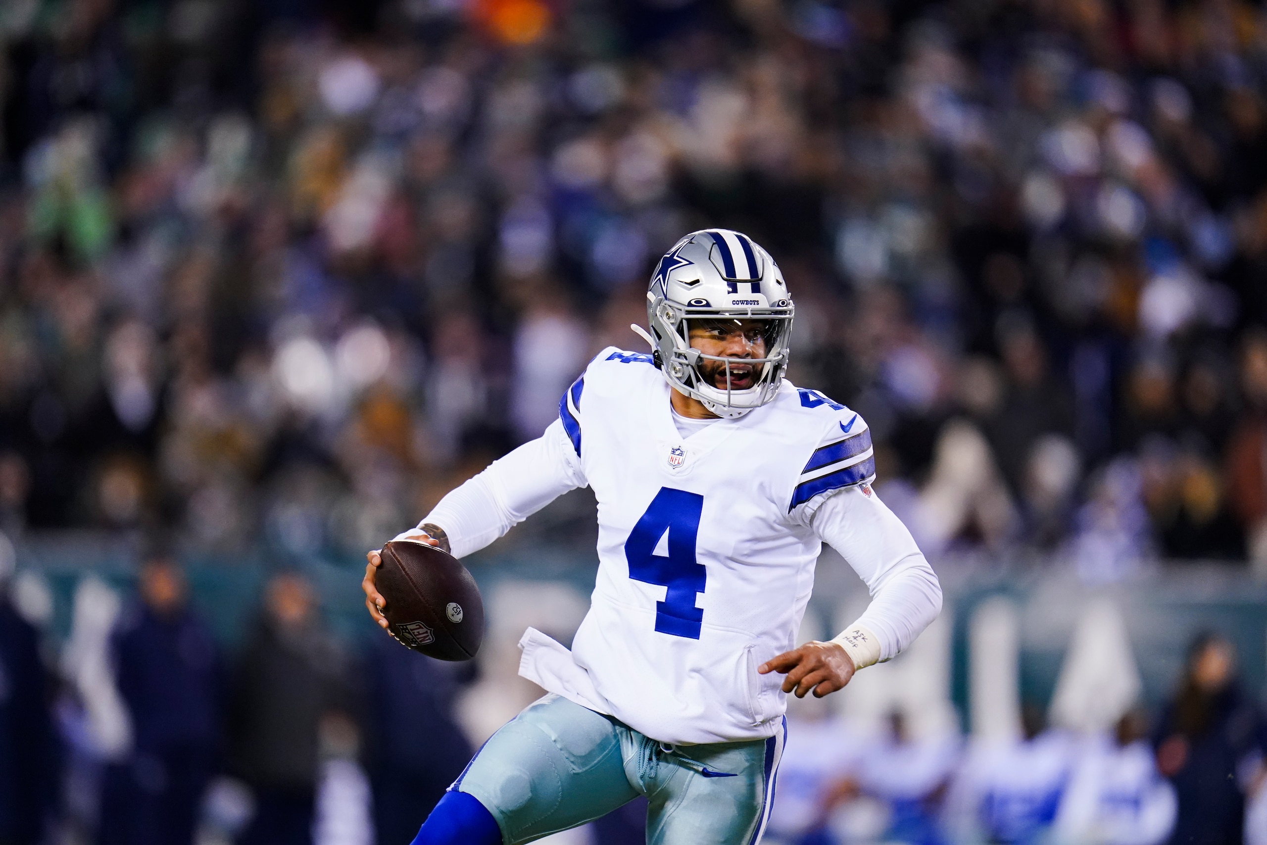 Dallas Cowboys quarterback Dak Prescott plays during the first half of an NFL football game against the Philadelphia Eagles, Saturday, Jan. 8, 2022, in Philadelphia. (AP Photo/Julio Cortez) Dallas Cowboys quarterback Dak Prescott plays during the first half of an NFL football game against the Philadelphia Eagles, Saturday, Jan. 8, 2022, in Philadelphia. (AP Photo/Julio Cortez)