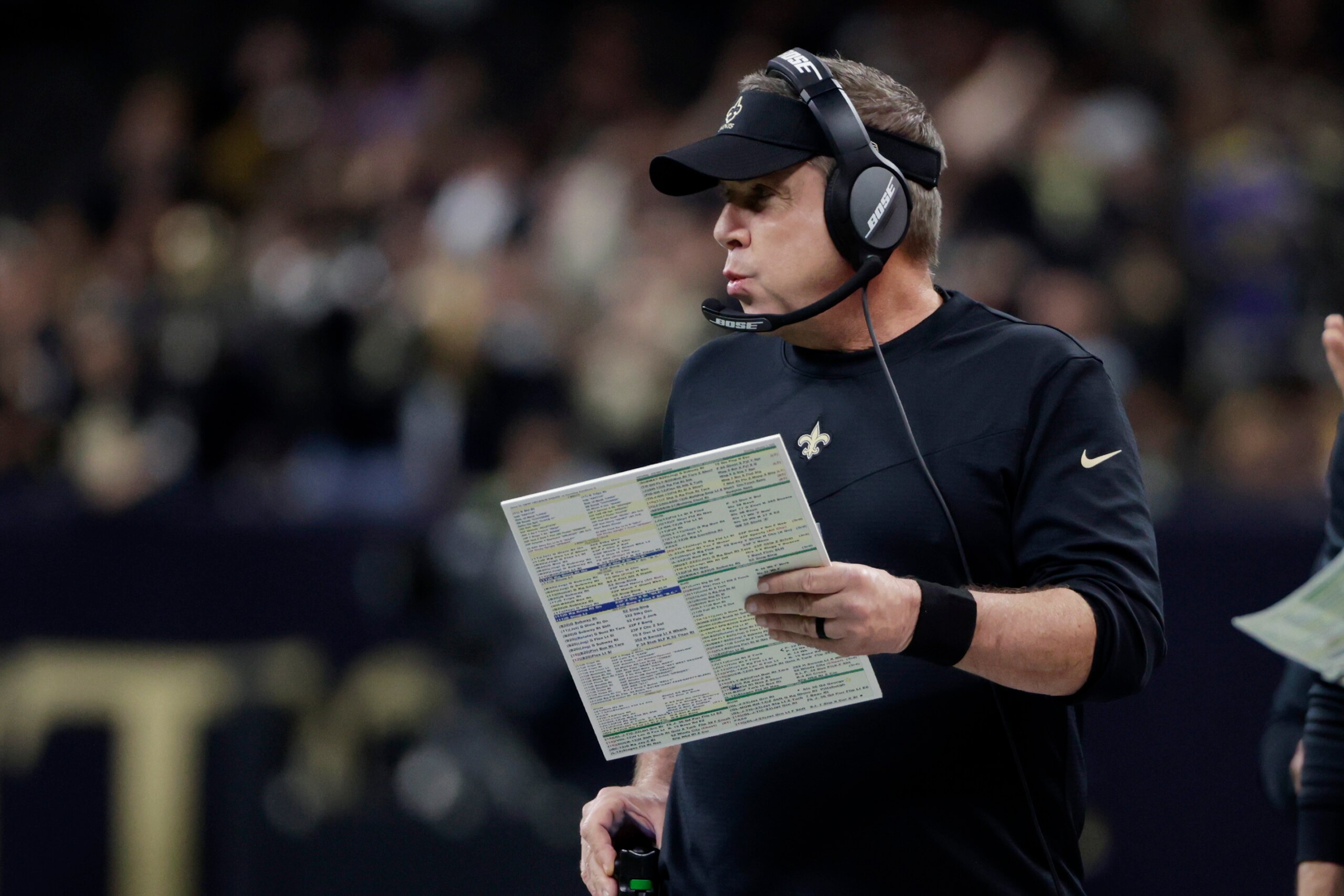 New Orleans Saints head coach Sean Payton calls out from the sideline in the first half of an NFL football game against the Carolina Panthers in New Orleans, Sunday, Jan. 2, 2022. (AP Photo/Derick Hingle)