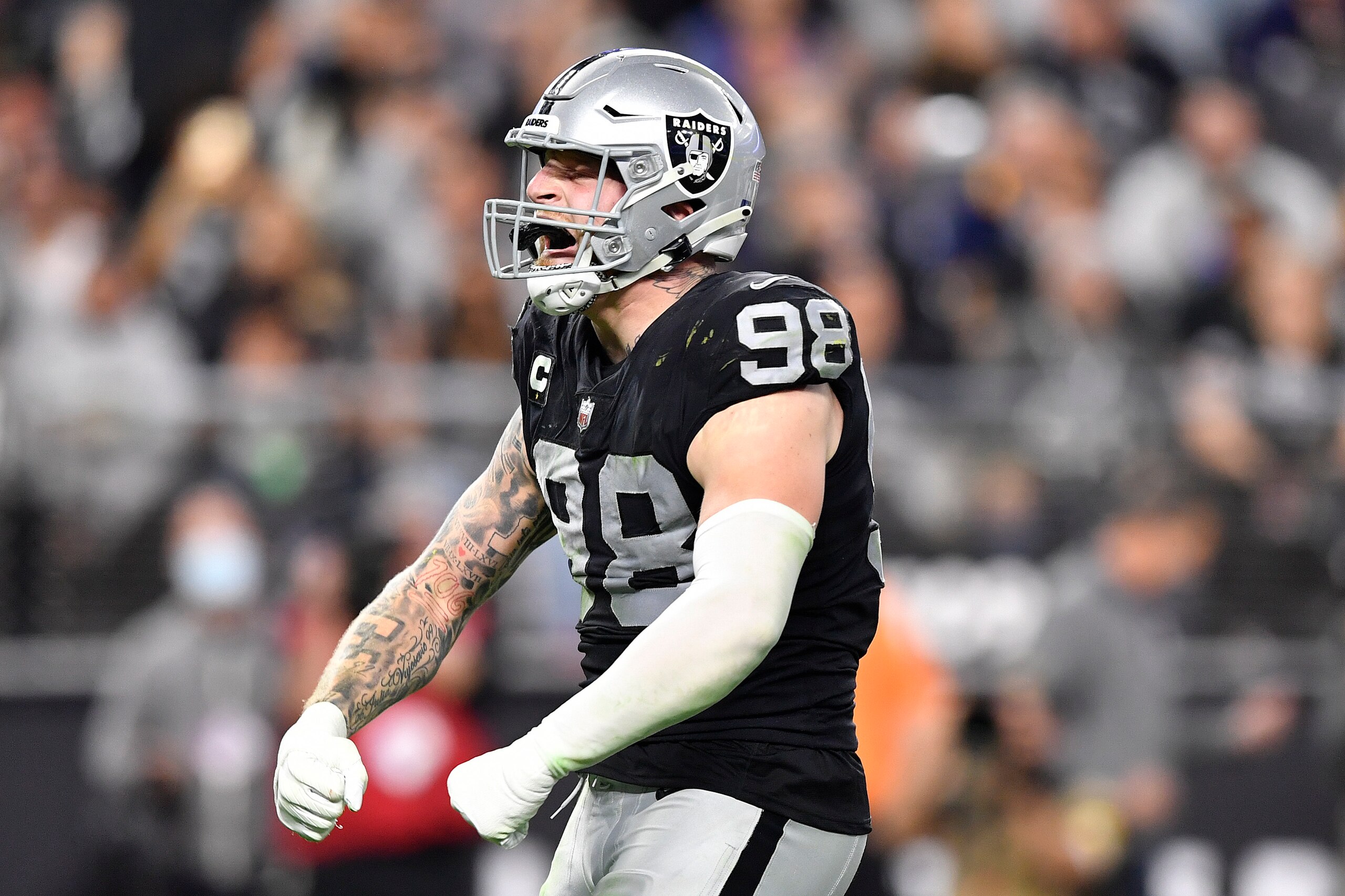 LAS VEGAS, NEVADA - JANUARY 09: Maxx Crosby #98 of the Las Vegas Raiders celebrates during the third quarter against the Los Angeles Chargers at Allegiant Stadium on January 09, 2022 in Las Vegas, Nevada. (Photo by Chris Unger/Getty Images)