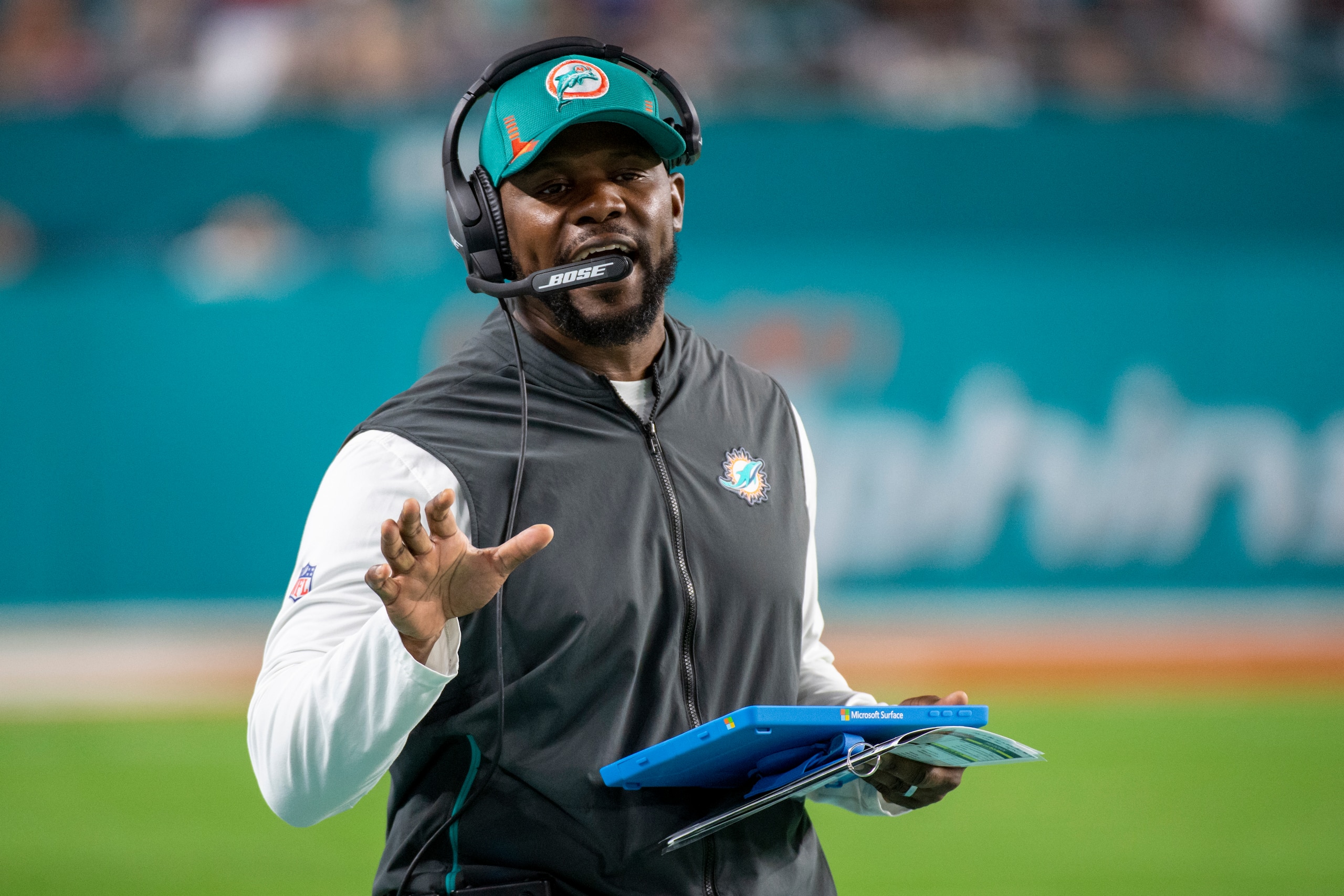 Miami Dolphins head coach Brian Flores gestures on the sidelines during an NFL football game against the New England Patriots, Sunday, Jan. 9, 2022, in Miami Gardens, Fla. (AP Photo/Doug Murray) Miami Dolphins head coach Brian Flores gestures on the sidelines during an NFL football game against the New England Patriots, Sunday, Jan. 9, 2022, in Miami Gardens, Fla. (AP Photo/Doug Murray)